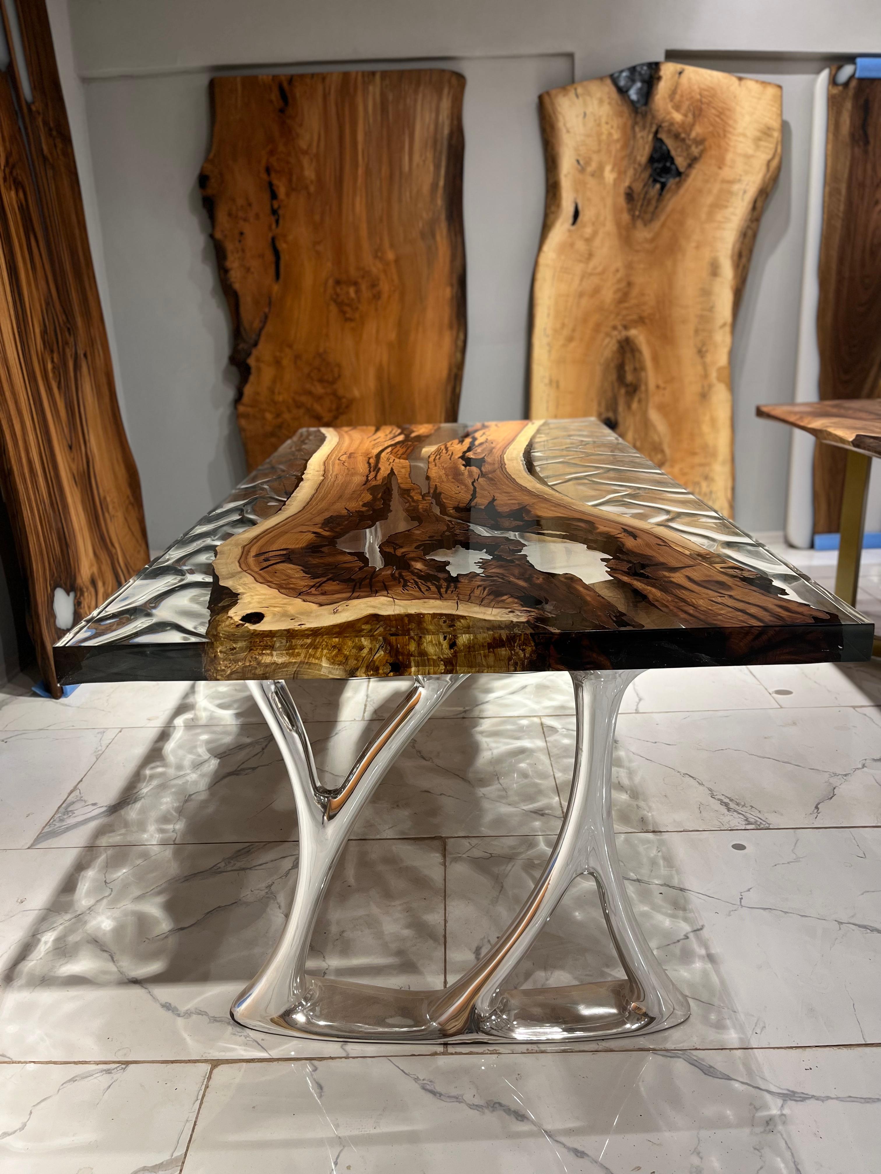 HACKBERRY CLEAR EPOXY RESIN DINING TABLE

This epoxy table emerges as a unique work of art, inspired by nature's beauty. 

The epoxy table stands out not only for its design but also its durability. Thanks to its epoxy coating, it is highly