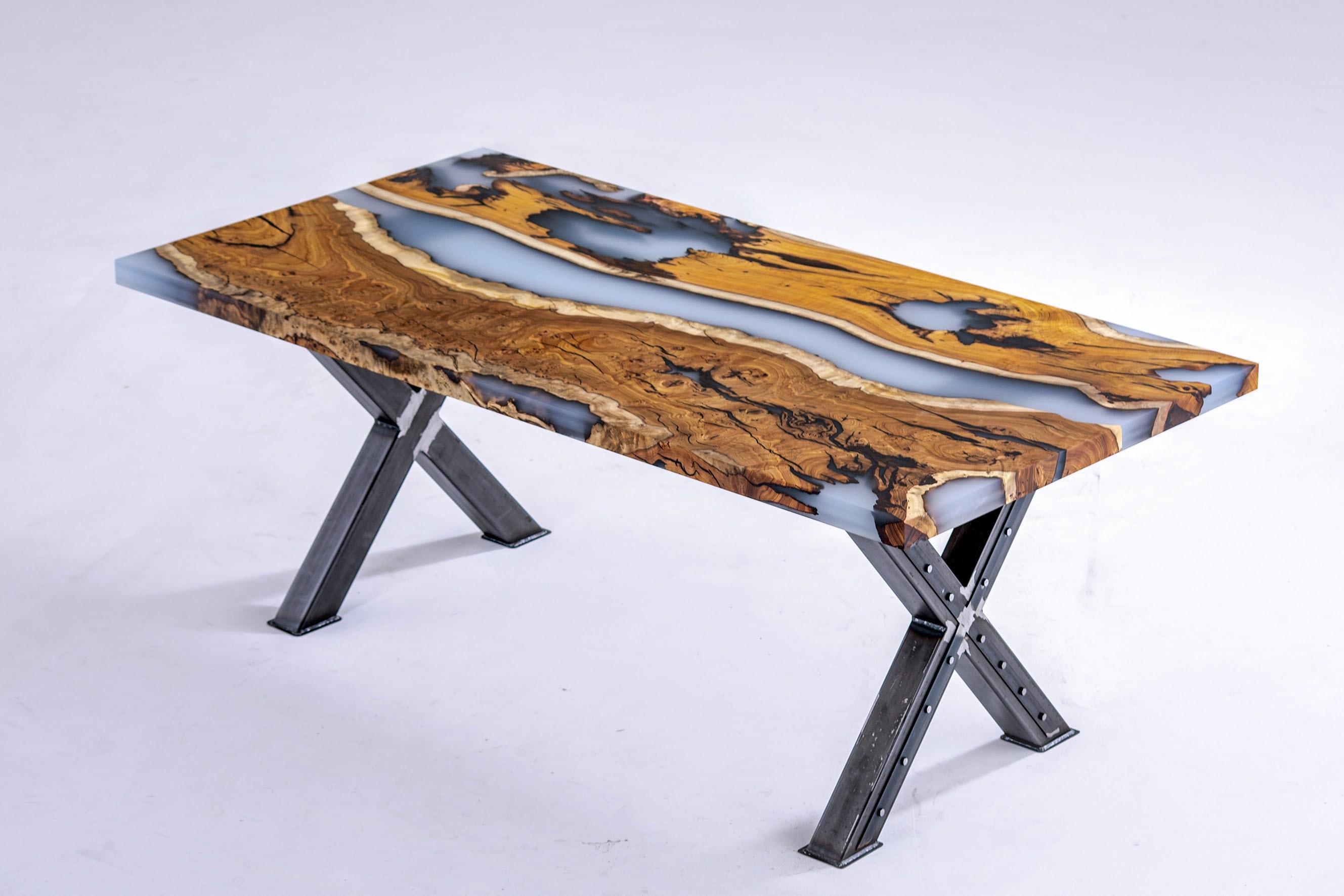 HACKBERRY SMOKE EPOXY RESIN DINING TABLE

This epoxy table emerges as a unique work of art, inspired by nature's beauty. 

The epoxy table stands out not only for its design but also its durability. Thanks to its epoxy coating, it is highly