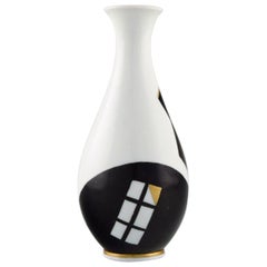Hackefors, Sweden, Concretistic Vase in Hand Painted Porcelain, Black and Gold Hackefors, Sweden, Concretistic Vase in Hand Painted Porcelain, Black and Gold