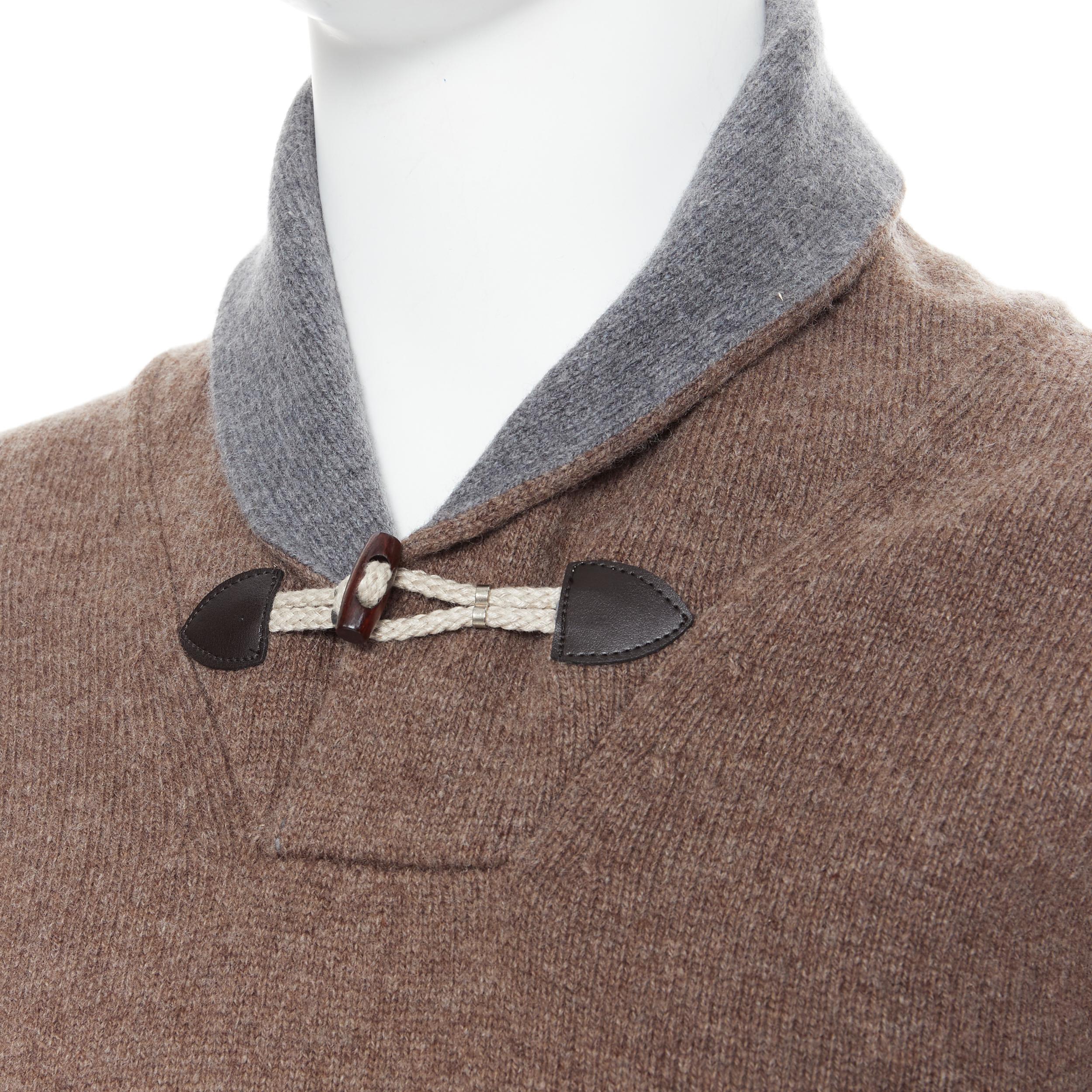 HACKETT Merino Cashmere brown grey shawl collar toggle pullover sweater XS 
Reference: PRCN/A00081 
Brand: Hackett 
Material: Wool 
Color: Brown 
Pattern: Solid 
Closure: Toggle 
Extra Detail: Merino Cashmere. Taupe brown upper. Grey shawl collar.