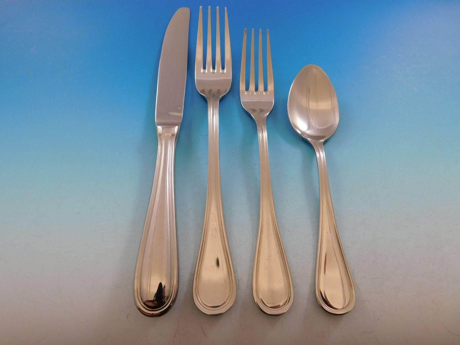 Hadley by Wallace stainless steel flatware set -66 pieces. This is a timeless pattern with simple threaded design. This set includes:

12 dinner knives, 9 1/4