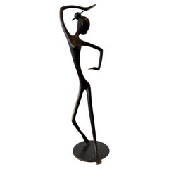 Sculture figurative in metallo