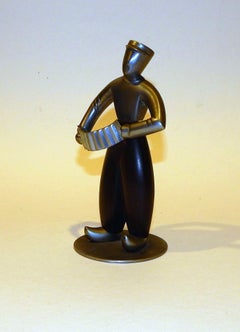 Hagenauer Figure, Dutch Accordian Player in Walnut and Brass, circa 1930s