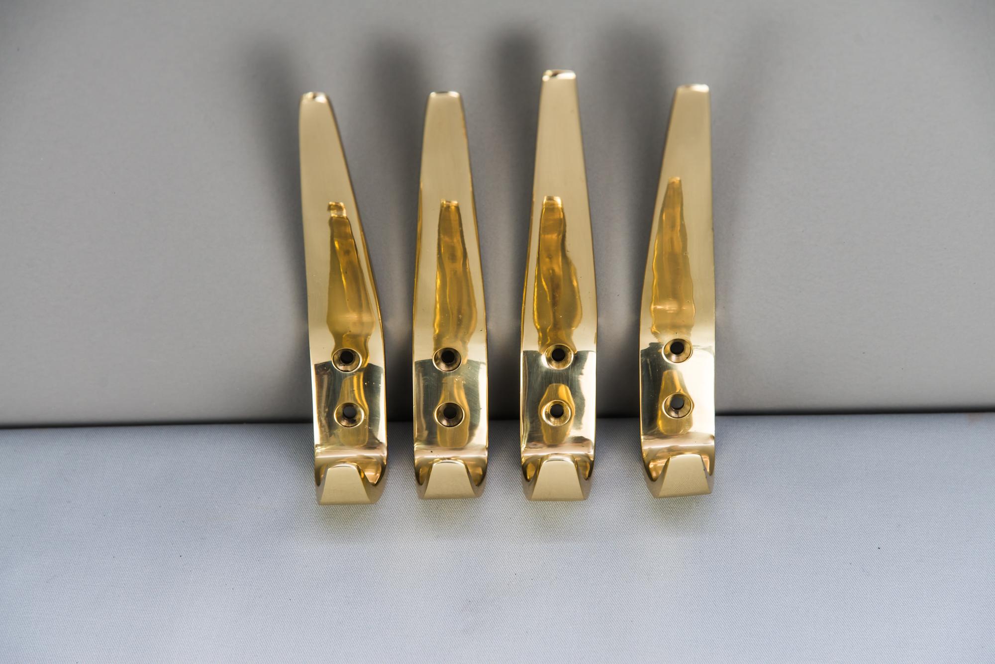 Hagenauer wall hooks, circa 1950s
Polished and stove enamelled.