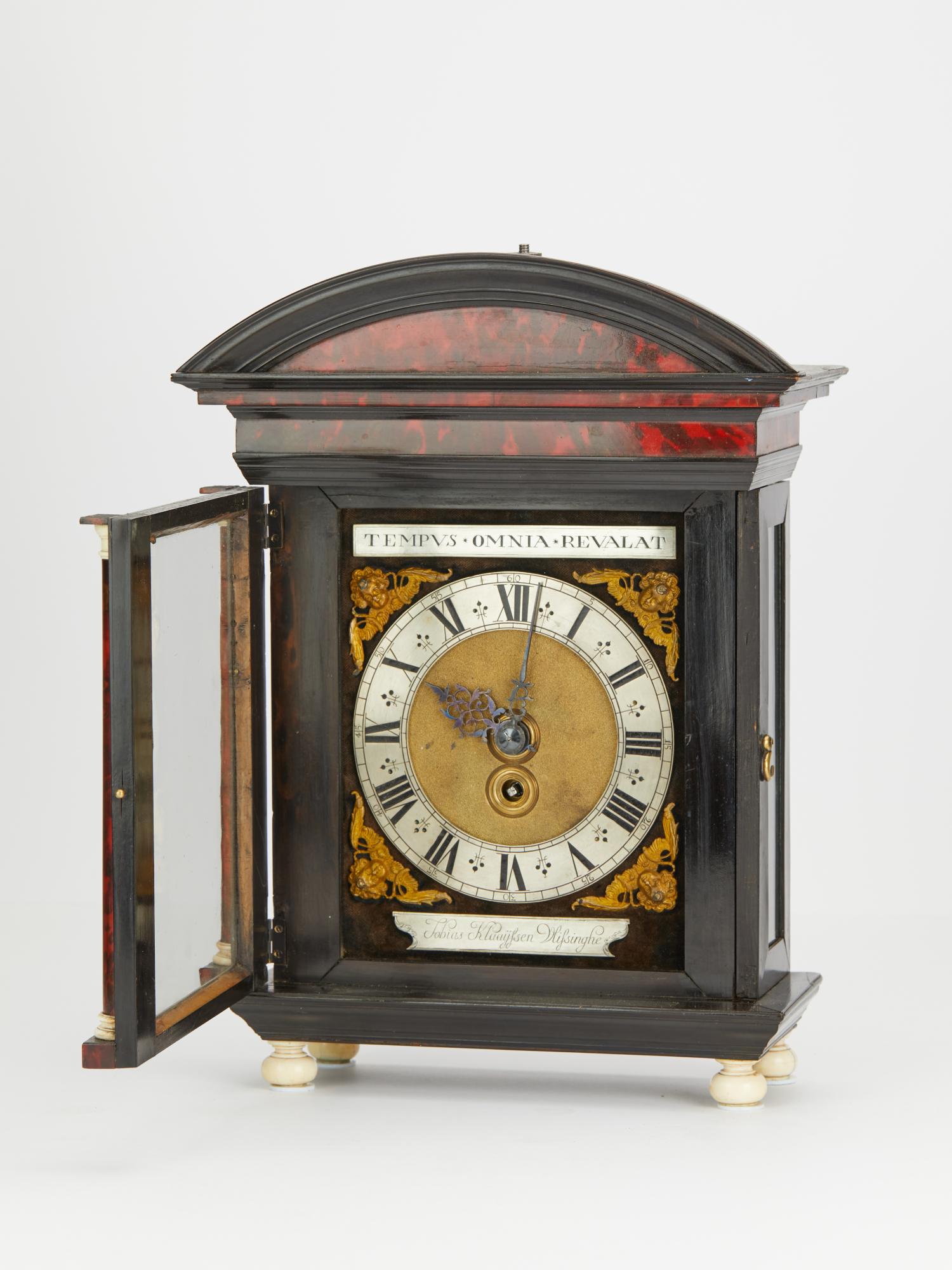 A tortoiseshell veneered Hague clock with elephant ivory mounted columns and ivory padfeet by Tobias Klaaijssen Vlissinghe. Completely checked and approved by Cites, declaration is available.