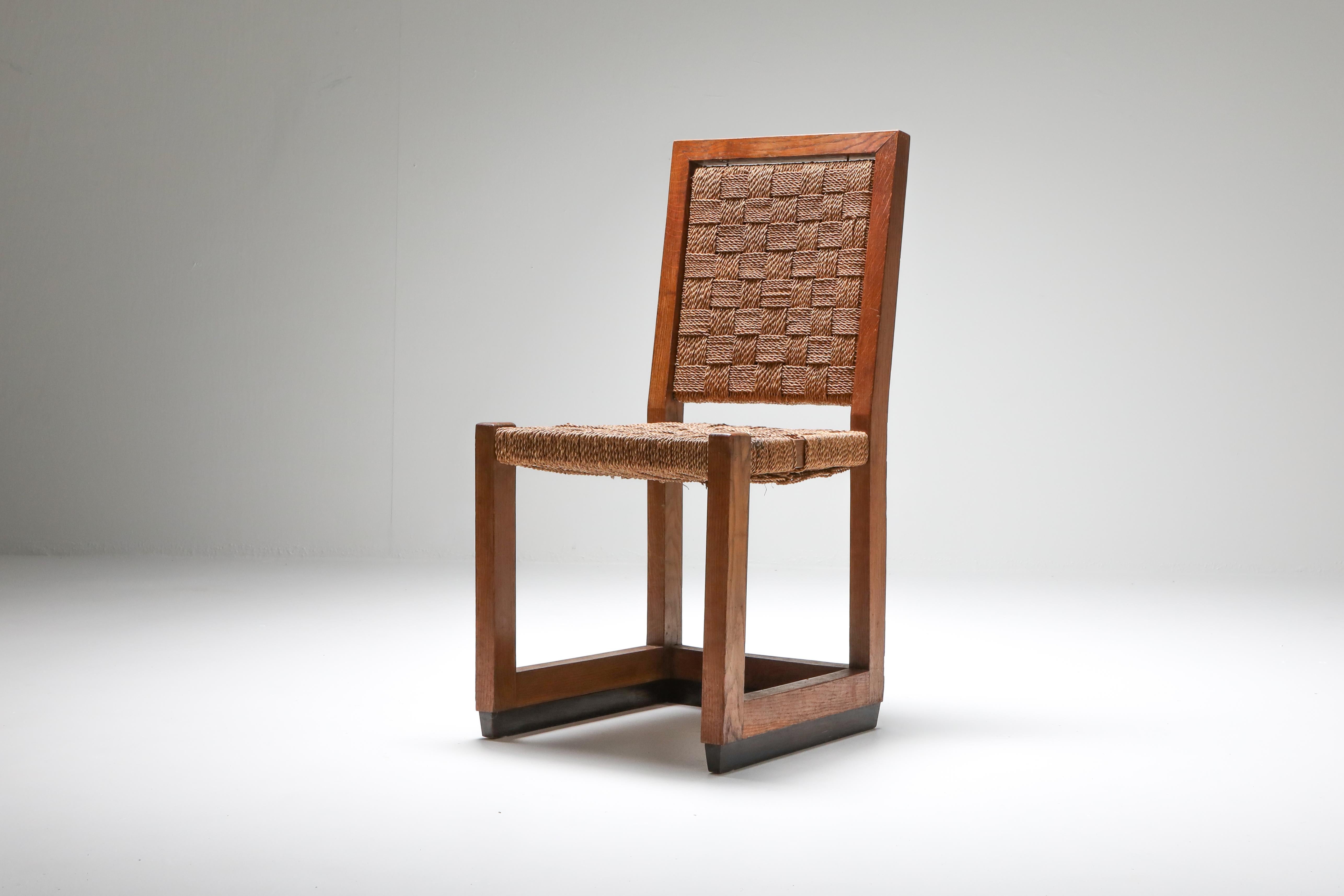 Art Deco era chair from The Netherlands, Hague School, 1920

Minimalist pre modernist piece from solid oak with cord seating.
Would fit well in a rustic modern, wabi sabi interior inspired by Axel Vervoordt.
  