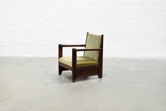 Poltrona scultorea della Scuola dell'Aia, Oak macchiato, Paesi Bassi, anni '20