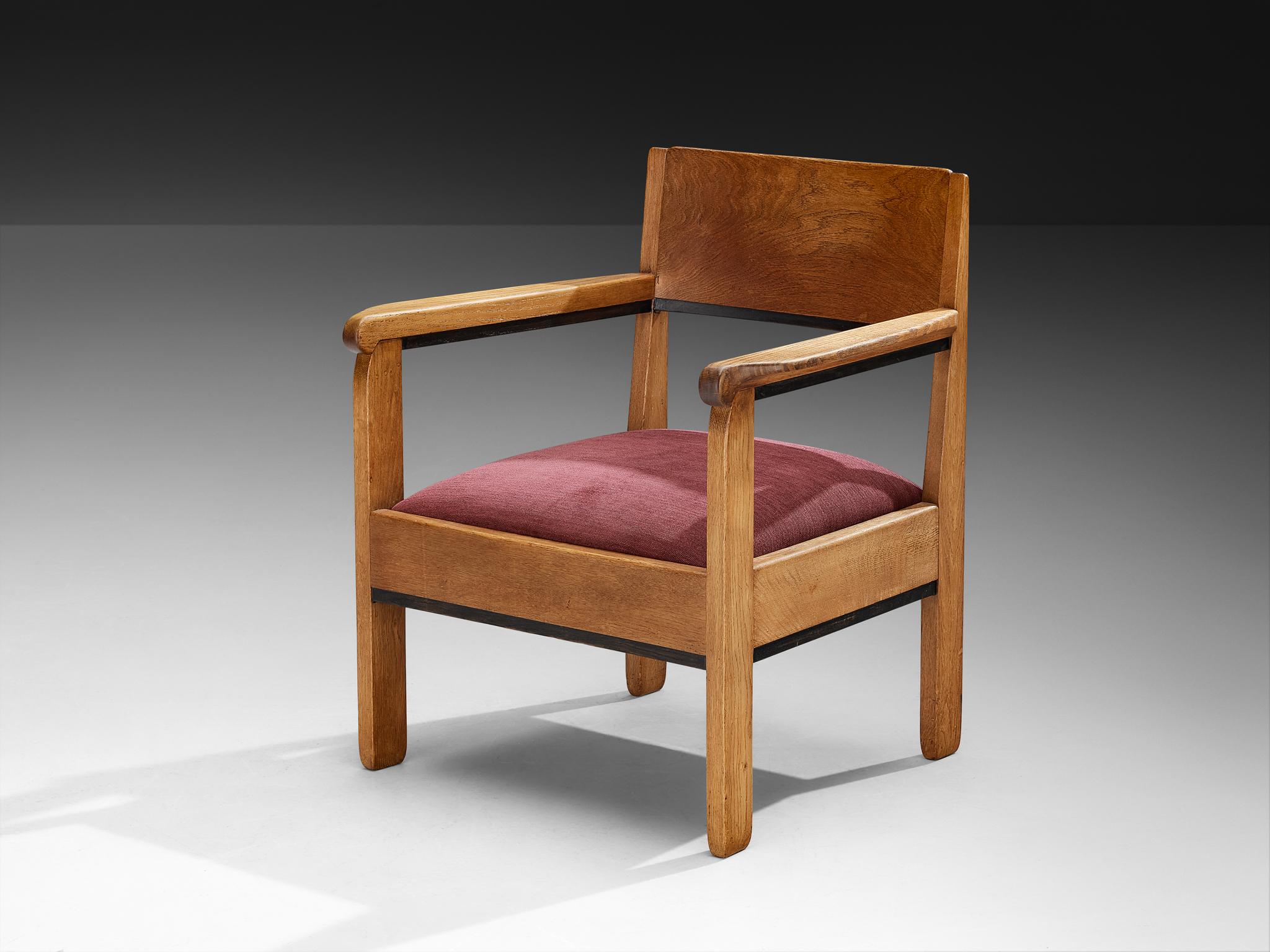 H. Fels lounge chair, oak, fabric, the Netherlands, 1930s

This refined lounge chair, designed by H. Fels in the 1930s, is a quintessential example of the Hague School,  a movement that emphasizes geometric shapes, simple proportions, and