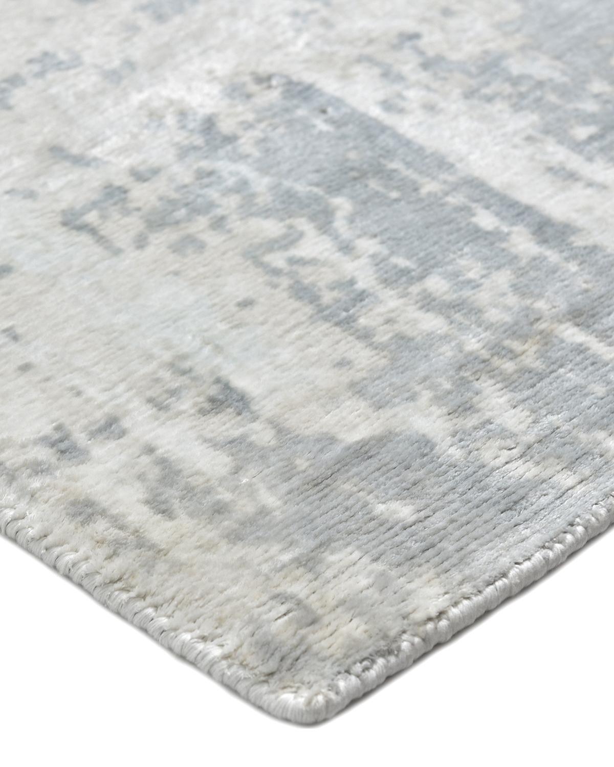 With their freeform motifs and sophisticated color play, the rugs in the Abstract collection imbue a room with a fresh, dynamic spirit. This collection was handcrafted, in India, using the finest-quality fibers and methods passed down for