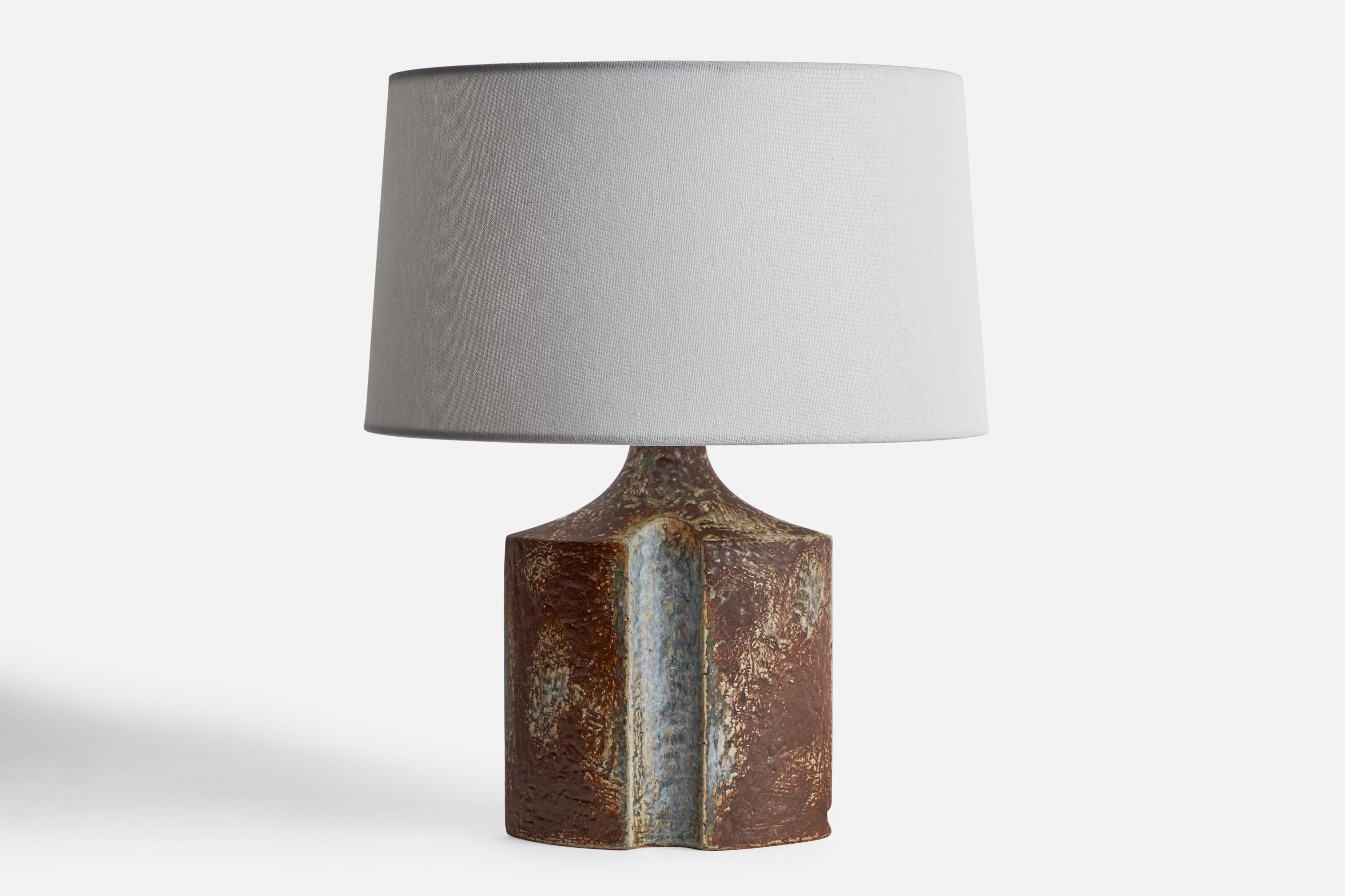A grey and brown-glazed stoneware table lamp designed by Haico Neitchze and produced by Søholm, Denmark, 1960s.

Dimensions of Lamp (inches): 10.8” H x 6.45” W x 3.45” D
Dimensions of Shade (inches): 4.5” Top Diameter x 10” Bottom Diameter x 5.25”