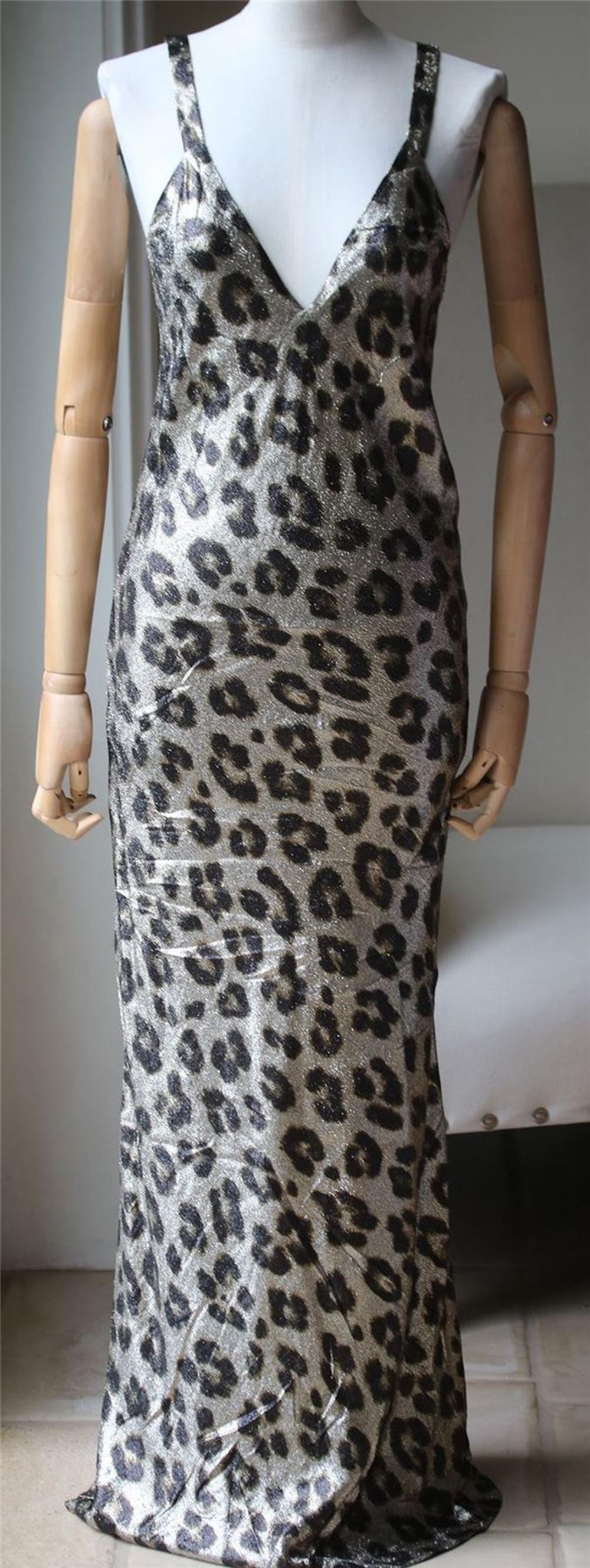 Silver-tone silk blend Andomeda long dress from Haider Ackermann. 61% Silk, 35% polyester, 4% spandex/elastane. Lining: 100% silk.

Size: FR 36 (UK 8, US 4, IT 40)

Condition: As new condition, no sign of wear. 