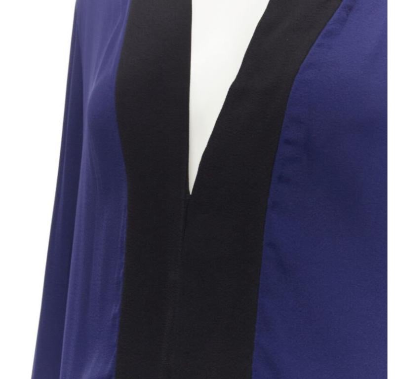 HAIDER ACKERMANN dark blue rayon black silk trimmed long robe jacket FR36 S
Reference: KEDG/A00050
Brand: Haider Ackermann
Designer: Haider Ackermann
Material: Rayon, Silk
Color: Blue, Black
Pattern: Solid
Extra Details: Open front. Black silk trim
