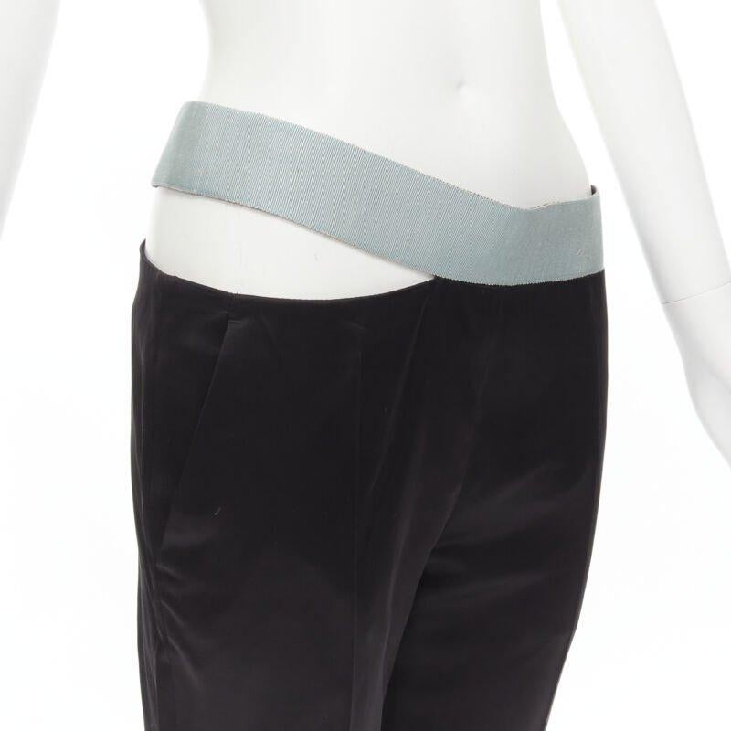 HAIDER ACKERMANN Heracleum black ice blue grosgrain cut out trousers FR36 XS
Reference: MELK/A00076
Brand: Haider Ackermann
Designer: Haider Ackermann
Material: Rayon, Blend
Color: Black, Blue
Pattern: Solid
Closure: Zip
Extra Details: Grosgrain