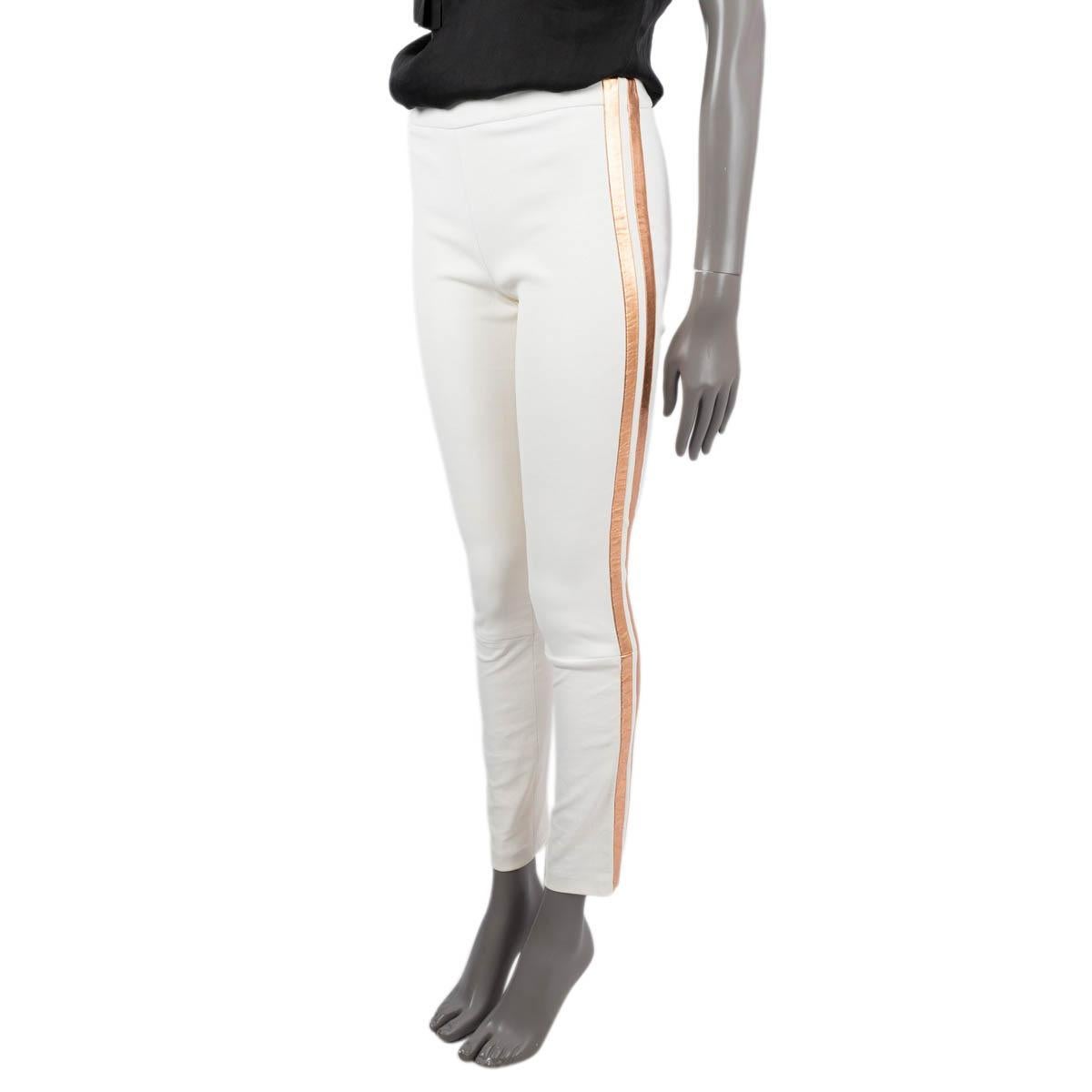 100% authenticHaider Ackermann leggings in ivory leather (please note size and content tag have been removed) with copper side-stripes. Elastic waist band. Have been worn and are in excellent condition.

Measurements
Tag Size	Missing
Size	S
Waist