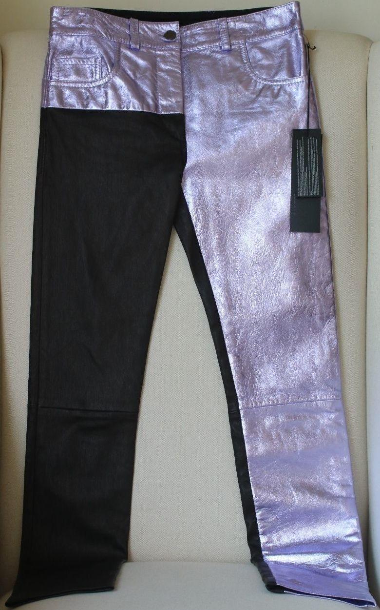 Haider Ackermann's electric color palette is inspired by birds-of-paradise. Seen on the runway, these pants have been made in Italy from supple metallic lilac leather with a graphic block of black. Lilac and black leather. Button and concealed zip