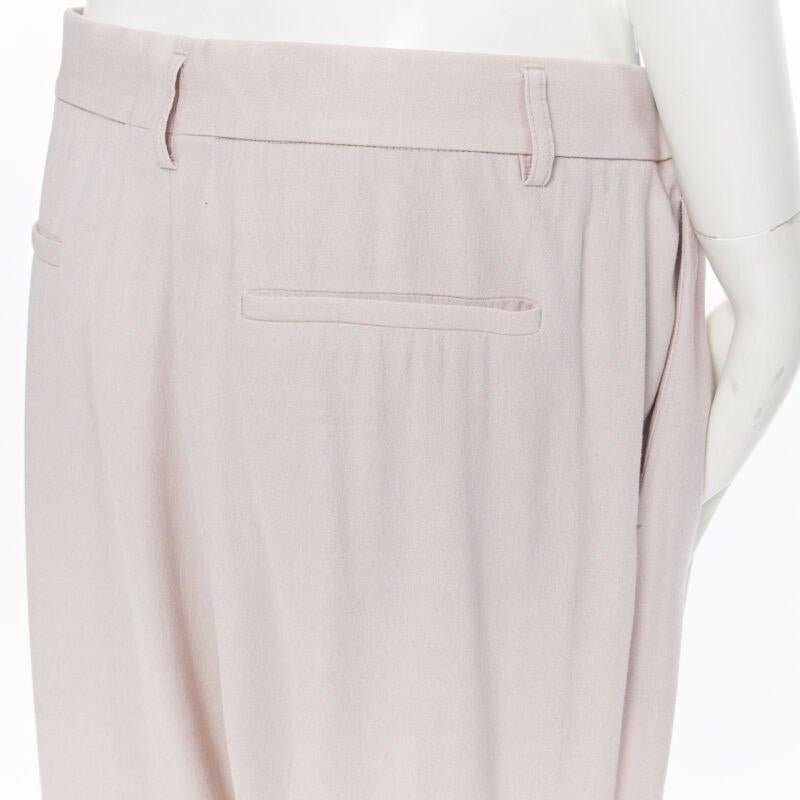 HAIDER ACKERMANN rayon wool blush pink wide leg trousers FR38
Reference: CNLE/A00090
Brand: Haider Ackermann
Designer: Haider Ackermann
Material: Others
Color: Pink
Pattern: Solid
Closure: Zip
Made in: Portugal

CONDITION:
Condition: Good, this item