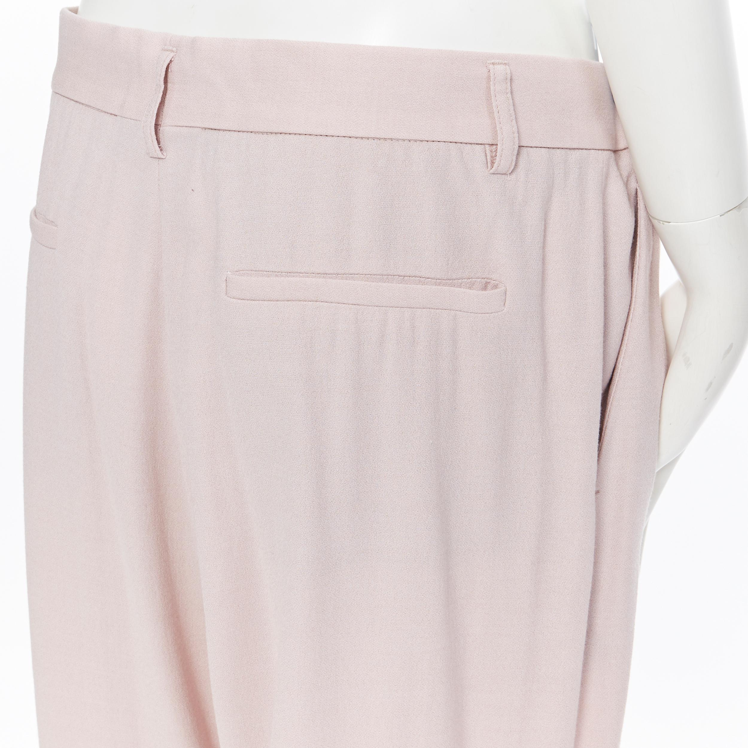 HAIDER ACKERMANN rayon  wool blush pink wide leg trousers FR38
Brand: Haider Ackermann
Designer: Haider Ackermann
Model Name / Style: Wide leg pants
Material: Other; rayon, fleecewool
Color: Pink
Pattern: Solid
Closure: Zip
Extra Detail:
Made in: