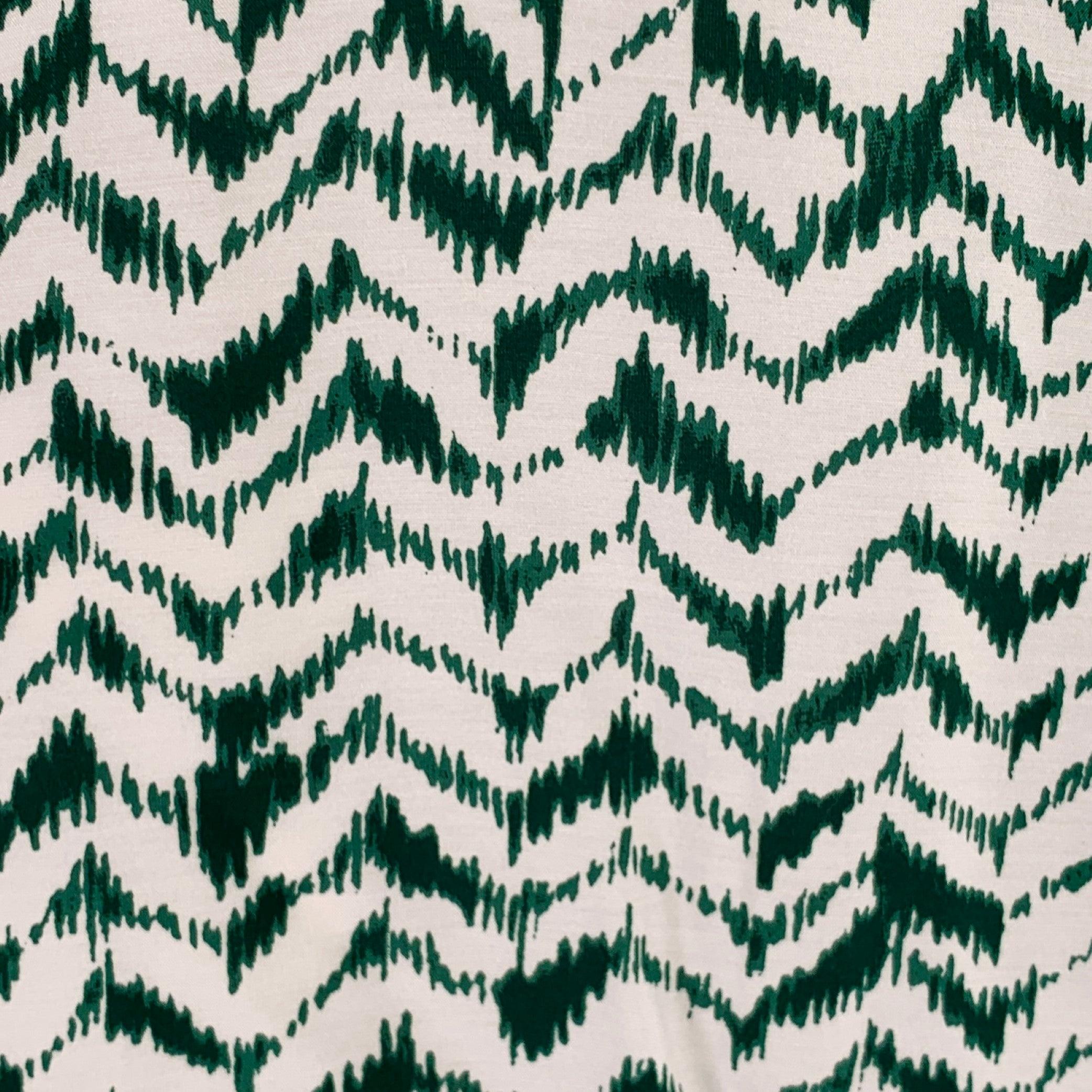 HAIDER ACKERMANN short sleeve shirt
in a green and white viscose silk blend fabri featuring a relaxed fit, zig zag print, and hidden button closure.New with Tags. 

Marked:   L 

Measurements: 
 
Shoulder: 26.5 inches Chest: 59 inches Sleeve: 14.5
