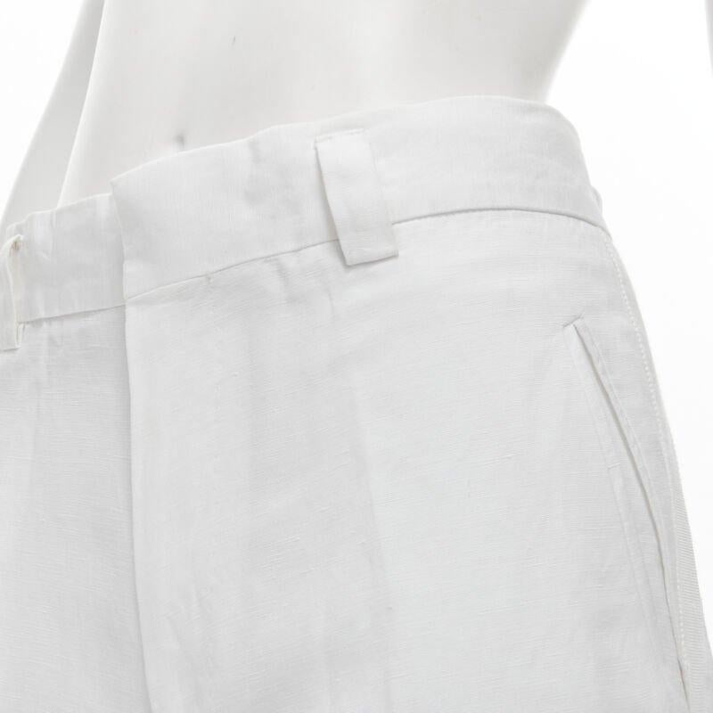 HAIDER ACKERMANN white grosgrain linen drop crotch cropped trousers FR38 S
Reference: CNLE/A00129
Brand: Haider Ackermann
Designer: Haider Ackermann
Model: White trousers
Material: Linen, Rayon
Color: White
Pattern: Solid
Closure: Zip
Made in: