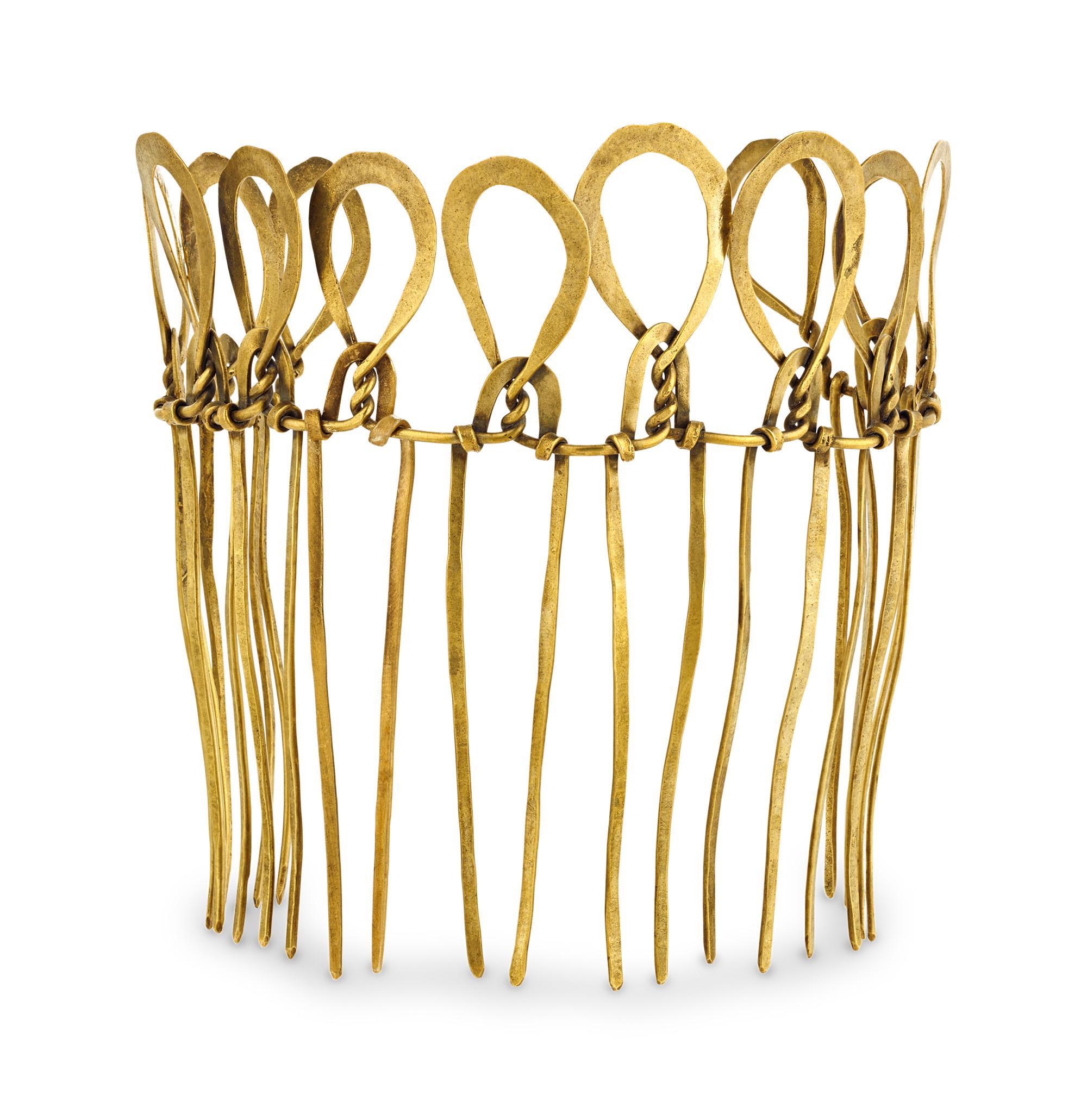 Alexander Calder
1898-1976  American

Hair Comb

Brass wire

This exceptional brass wire hair comb by Alexander Calder exemplifies the artist's revolutionary approach to sculptural form, transforming simple materials into a wearable masterpiece of
