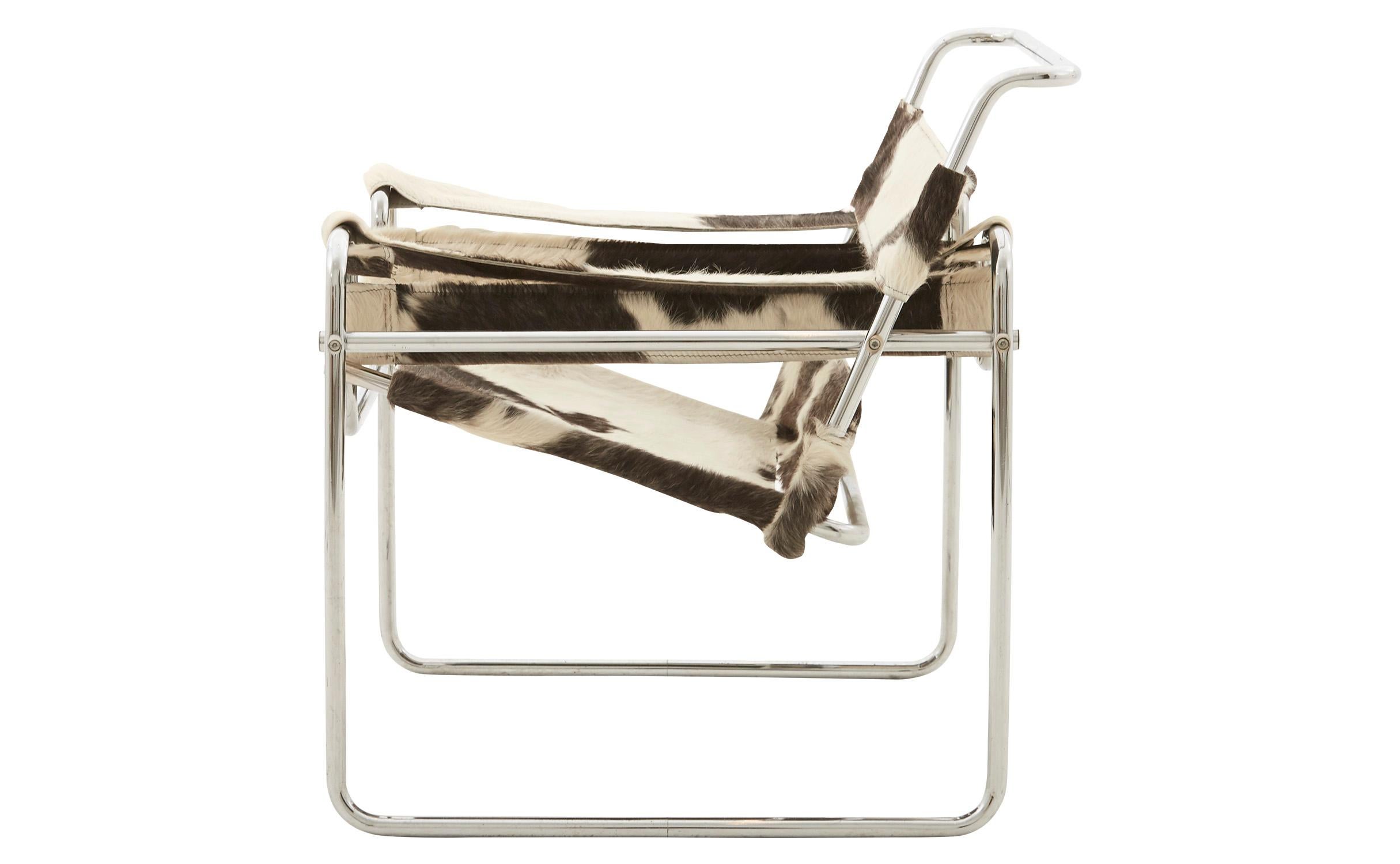 • Hair on hide upholstery as found
• Chrome frame
• 20th century
• American.

Dimensions:
• 31