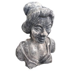 Escultura de jardín de mujer haitiana