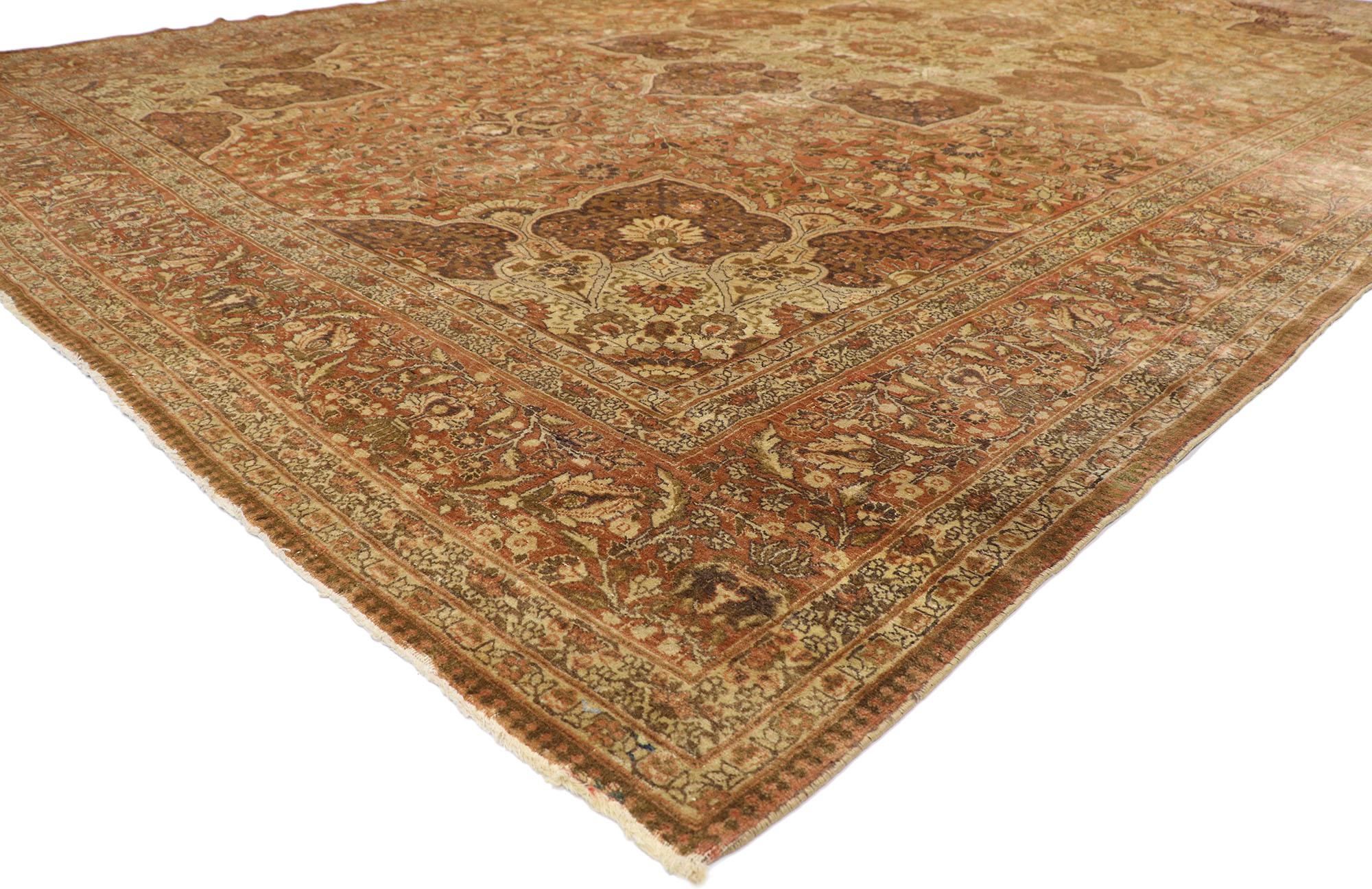 73962, Haji Khalili antique Persian Tabriz Palace size rug with warm, rustic style. This hand-knotted wool Haji Khalili antique Persian Tabriz palace size rug features an eight-point centre medallion filled with blooming palmettes and florals