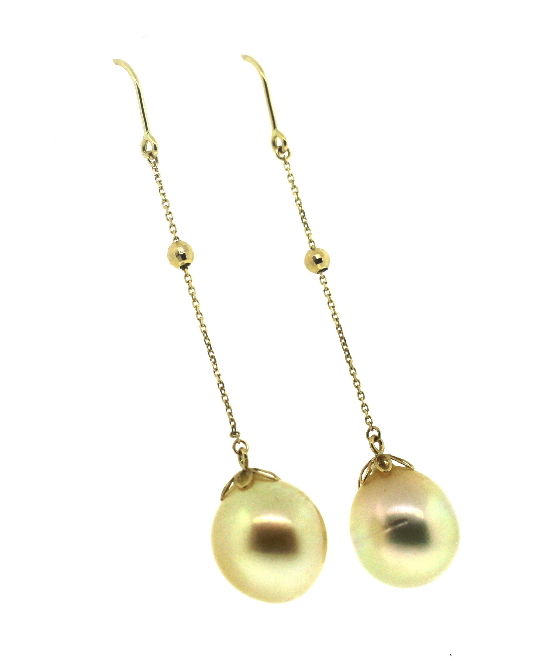 Hakimoto By Jewel Of Ocean
18K White Gold  
South Sea Culture Pearl Earrings.
Total item weight 6.3 grams
12-13mm  South Sea Drop Cultured Pearls
18K Yellow Gold High Polish
Orient: Very Good
Luster: Very Good
Nacre: Very Good