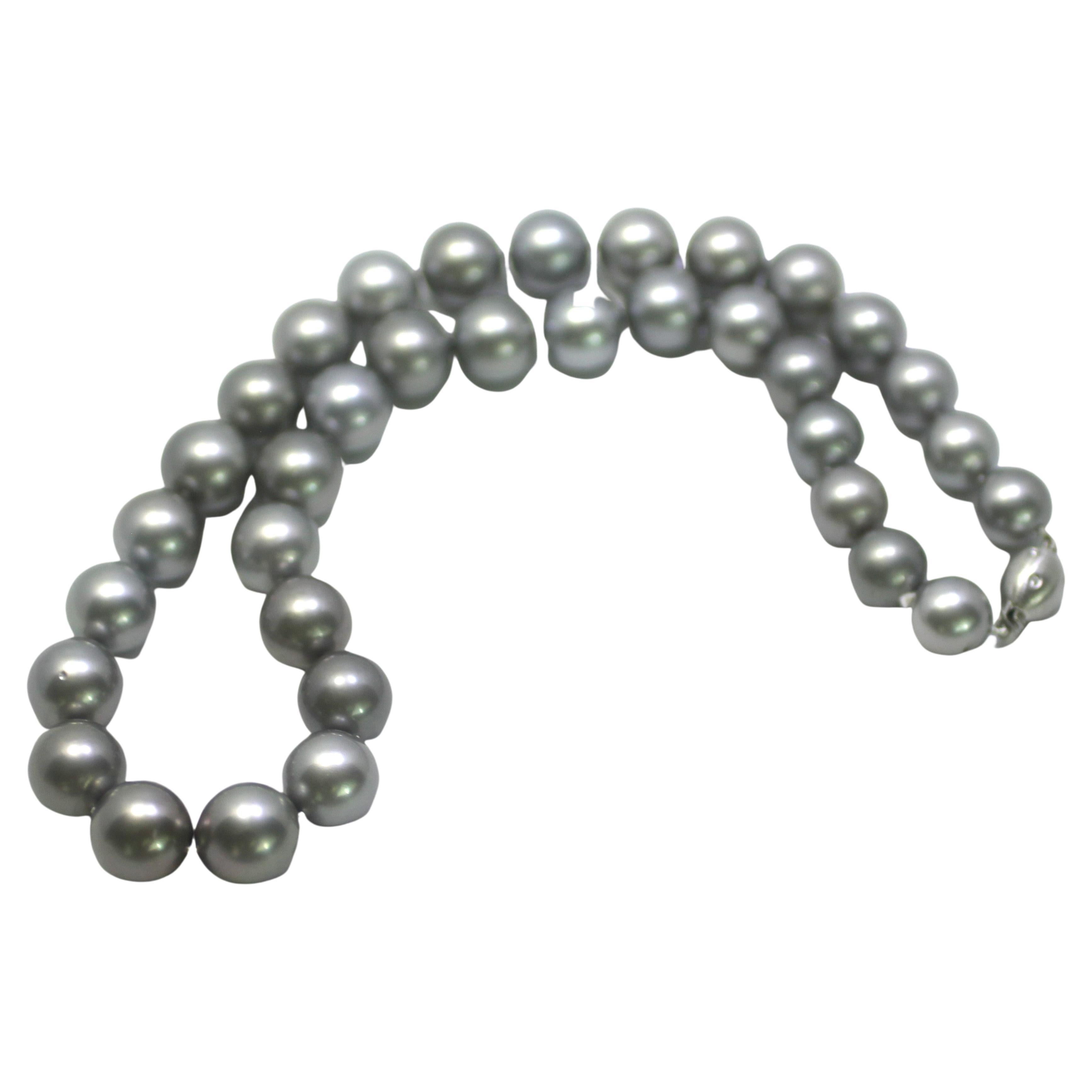 Hakimoto By Jewel Of Ocean 18K Tahitian South Sea Pearl Strand Necklace
18K White Gold With Diamonds Clasp  
Weight (g): 119
Cultured Tahitian South Sea Pearl 
Pearl Size: 12X14.7mm 
Pearl Shape: Round 
Body color: Silver
Orient: Very Good
Luster: