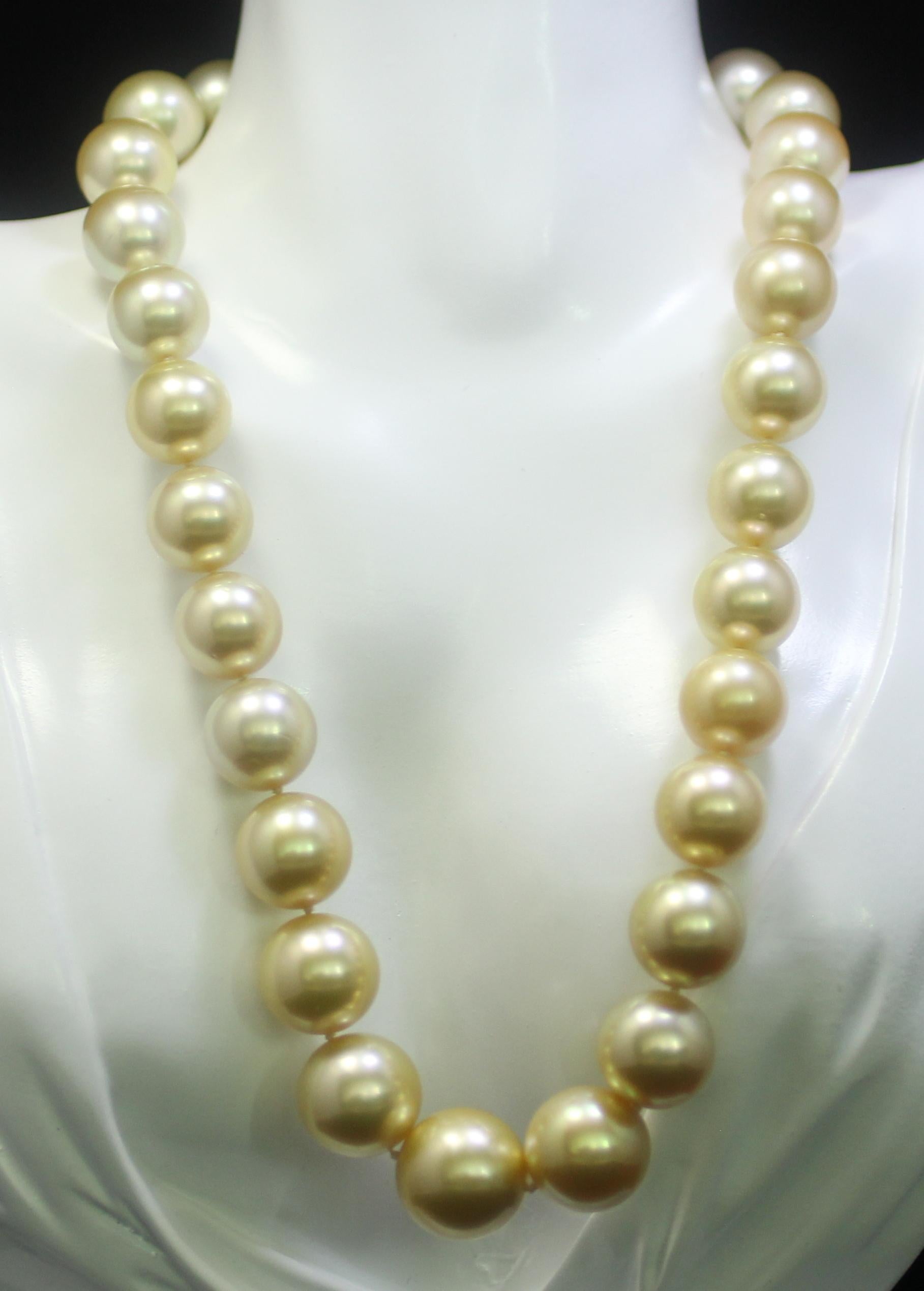 Hakimoto By Jewel Of Ocean 18K Natural Golden Color South Sea Pearl Strand Necklace
18K White Gold  1.75 Carts Diamonds Clasp
Weight (g): 124
Cultured Natural Color Golden South Sea Pearl 
Pearl Size: 13X16.8mm 
Pearl Shape: Round
Body color: