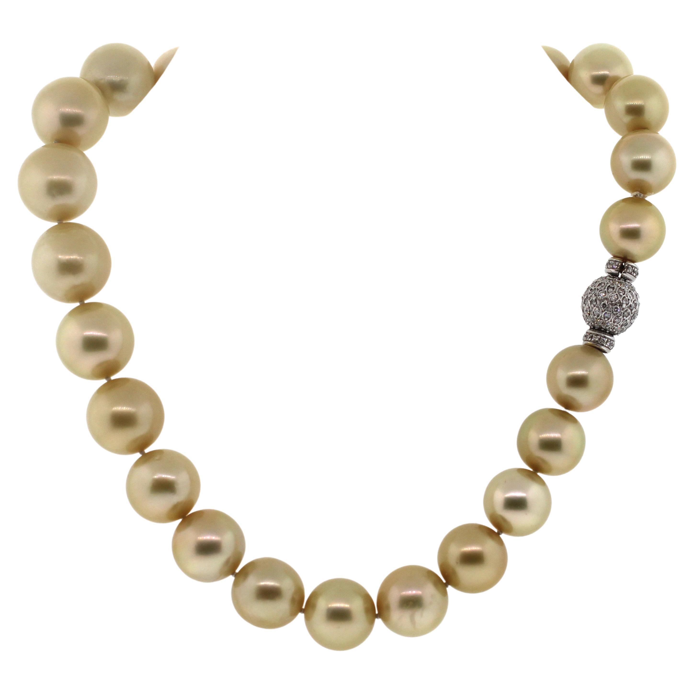 Modern Hakimoto 16x14mm Natural Golden color SouthSea Pearl 18K & 3 Carts Diamond For Sale