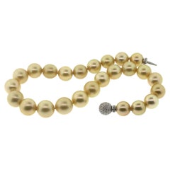 Hakimoto 16x14mm Natural Golden color SouthSea Pearl 18K & 3 Carts Diamond