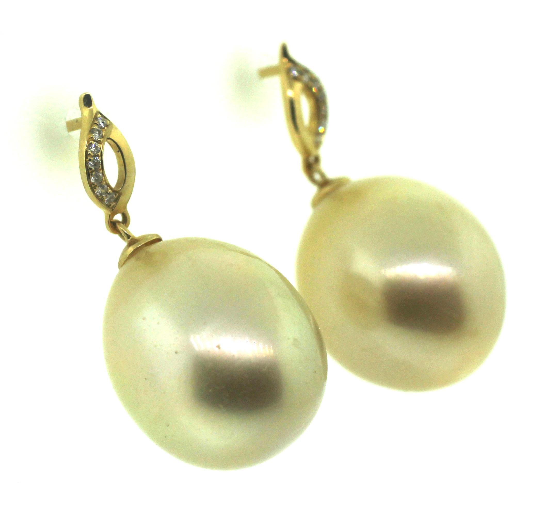 Hakimoto By Jewel Of Ocean
18K White Gold and Diamond 
Natural Color South Sea Drop Pearl Earrings
Total item weight 8 grams
Featuring 0.03 Carats of Round Brilliant Diamonds
15-13mm South Sea Drop Cultured Pearls
18K Yellow Gold High Polish
Orient: