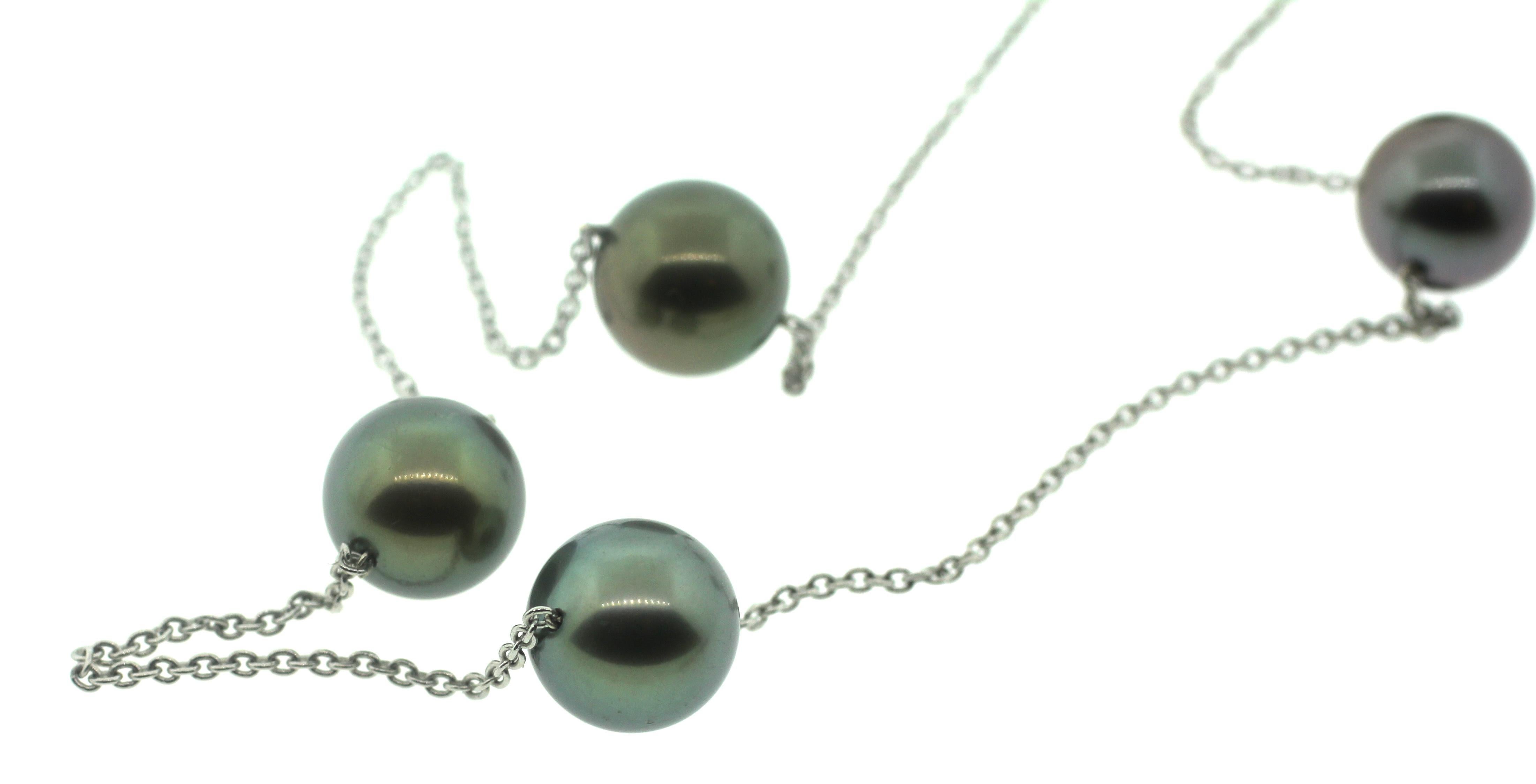 Hakimoto By Jewel Of Ocean Station Necklace
A classic and wearable Natural Color Tahitian Station pearl necklace. 
The necklace is Made with 7 Baroque South Sea Pearls size 10-11mm. 
The pearls are connected by 18 karat gold 
It is Modern And