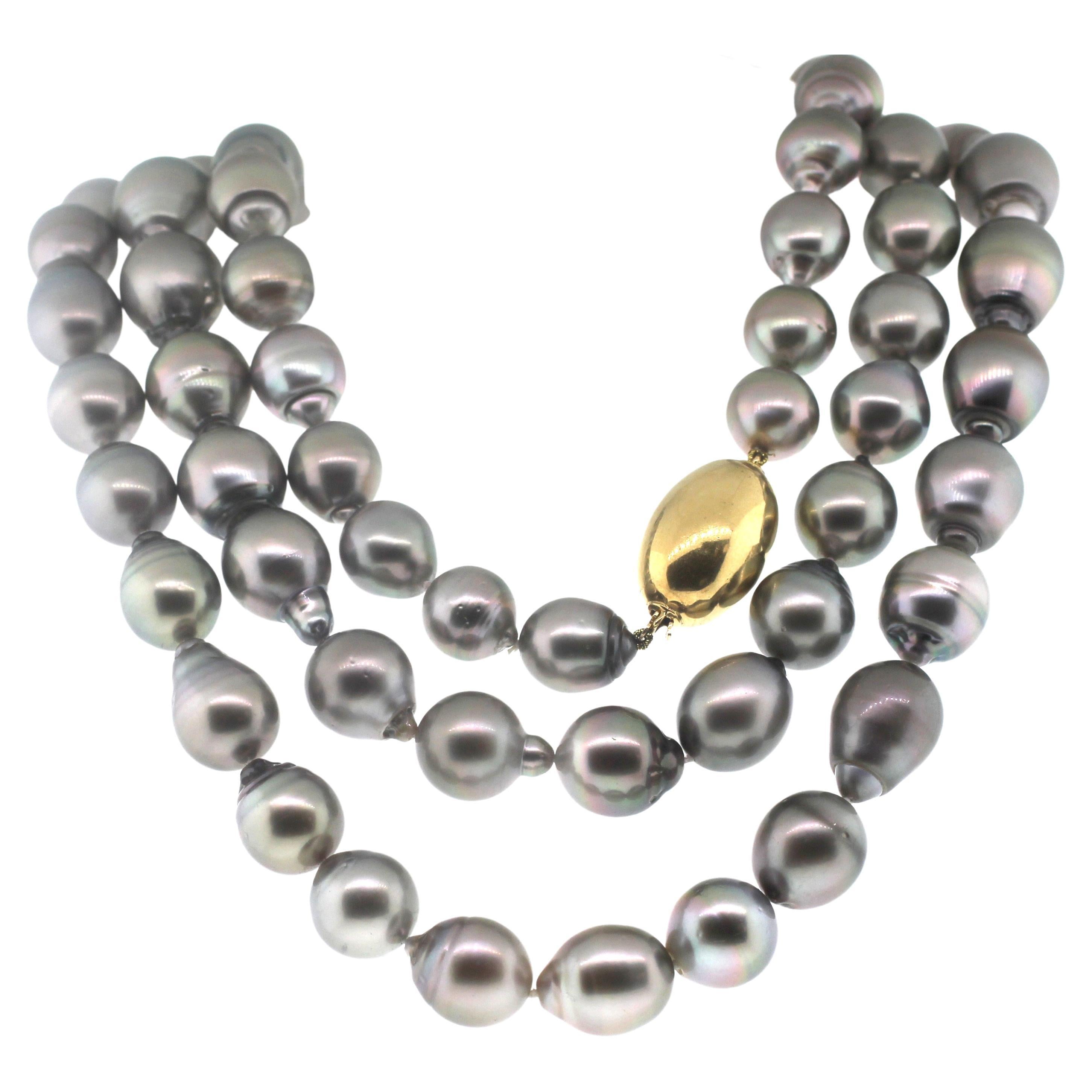 Hakimoto By Jewel Of Ocean 18K Tahitian South Sea Strand Necklace
18K Yellow Gold  
Weight (g): 266
69 Cultured South Sea Tahitian Pearl 
Pearl Size: 12X15mm 
Pearl Shape: Baroque 
Body color: Silver 
Orient: Very Good
Luster: Very Good 
Surface: 