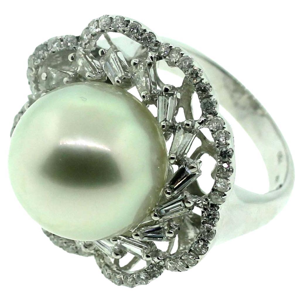 HAKIMOTO By Jewel Of Ocean 18K white gold & Diamonds cocktail ring with Approximately 5 carats of Baguette and round brilliant diamonds, 
14.5 mm White South Sea cultured pearl at center.
Creator: Hakimoto By Jewel Of Ocean
Metal: 18k White