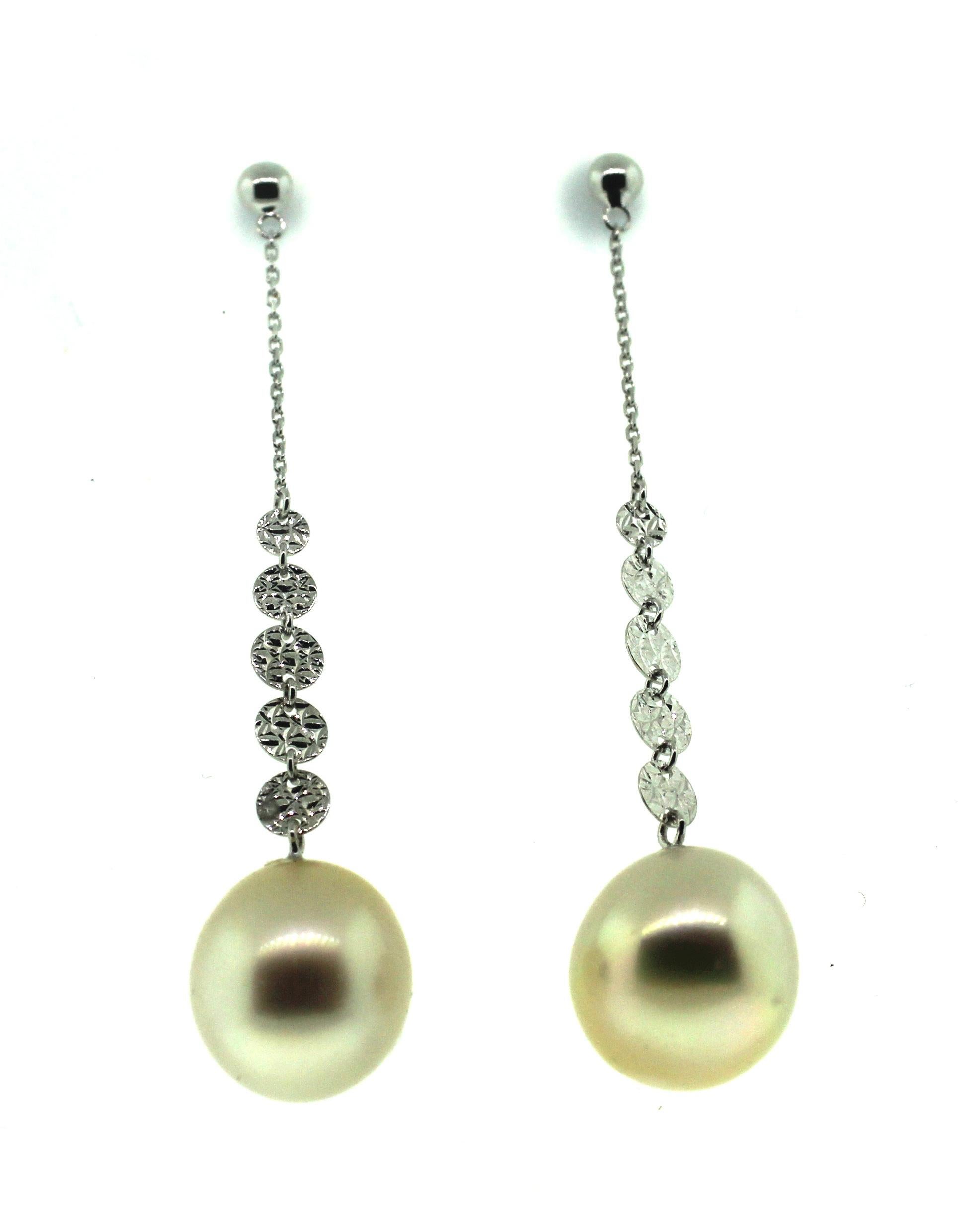 Hakimoto By Jewel Of Ocean
18K White Gold 
Natural Color Drop Cultured Pearl Earrings.
Total item weight 5.4 grams
11.5x12.5 mm Natural color South Sea Drop Cultured Pearls
18K White Gold High Polish
Orient: Very Good
Luster: Very Good
Nacre: Very