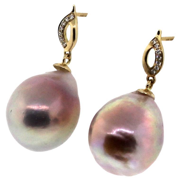 Hakimoto By Jewel Of Ocean
18K Yellow Gold and Diamond 
Fancy Natural Color Metallic Baroque Pearl Earrings.
Hight 1 inch
Total item weight 6.7 grams
Featuring 0.038 Carats of Round Brilliant Diamonds
14-12mm Fancy Metallic color Baroque Cultured