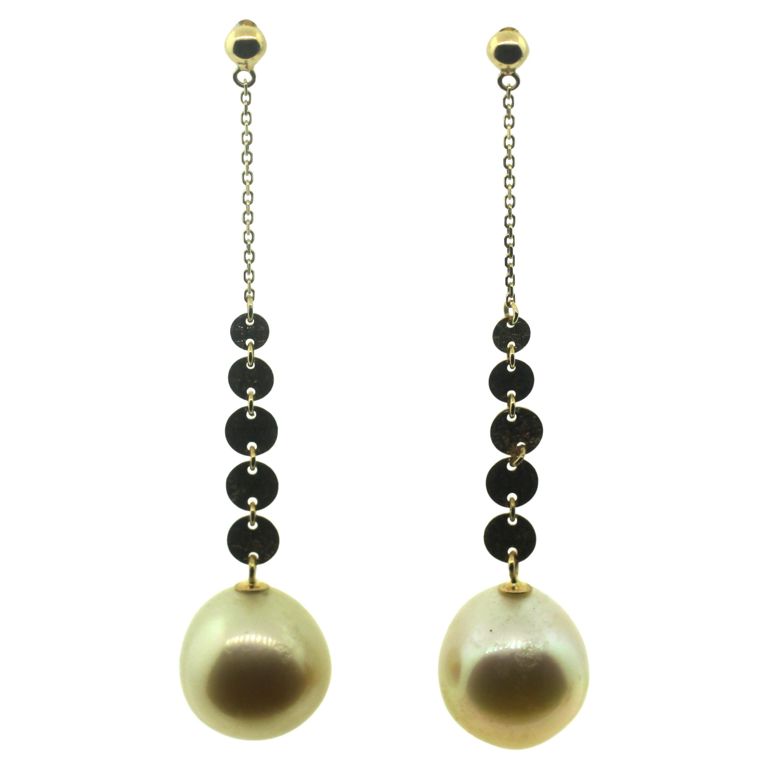 Hakimoto By Jewel Of Ocean
18K Yellow Gold 
Natural Color Drop Cultured Pearl Earrings.
Total item weight 5.2 grams
11 mm Natural color South Sea Cultured Pearl
Orient: Very Good
Luster: Very Good
Nacre: Very Good
