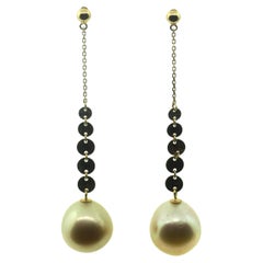 Orecchini di perle dei mari del sud Hakimoto in oro giallo 18k di colore naturale
