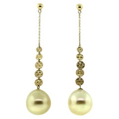 Boucles d'oreilles Hakimoto en or jaune 18 carats perles des mers du Sud de couleur naturelle
