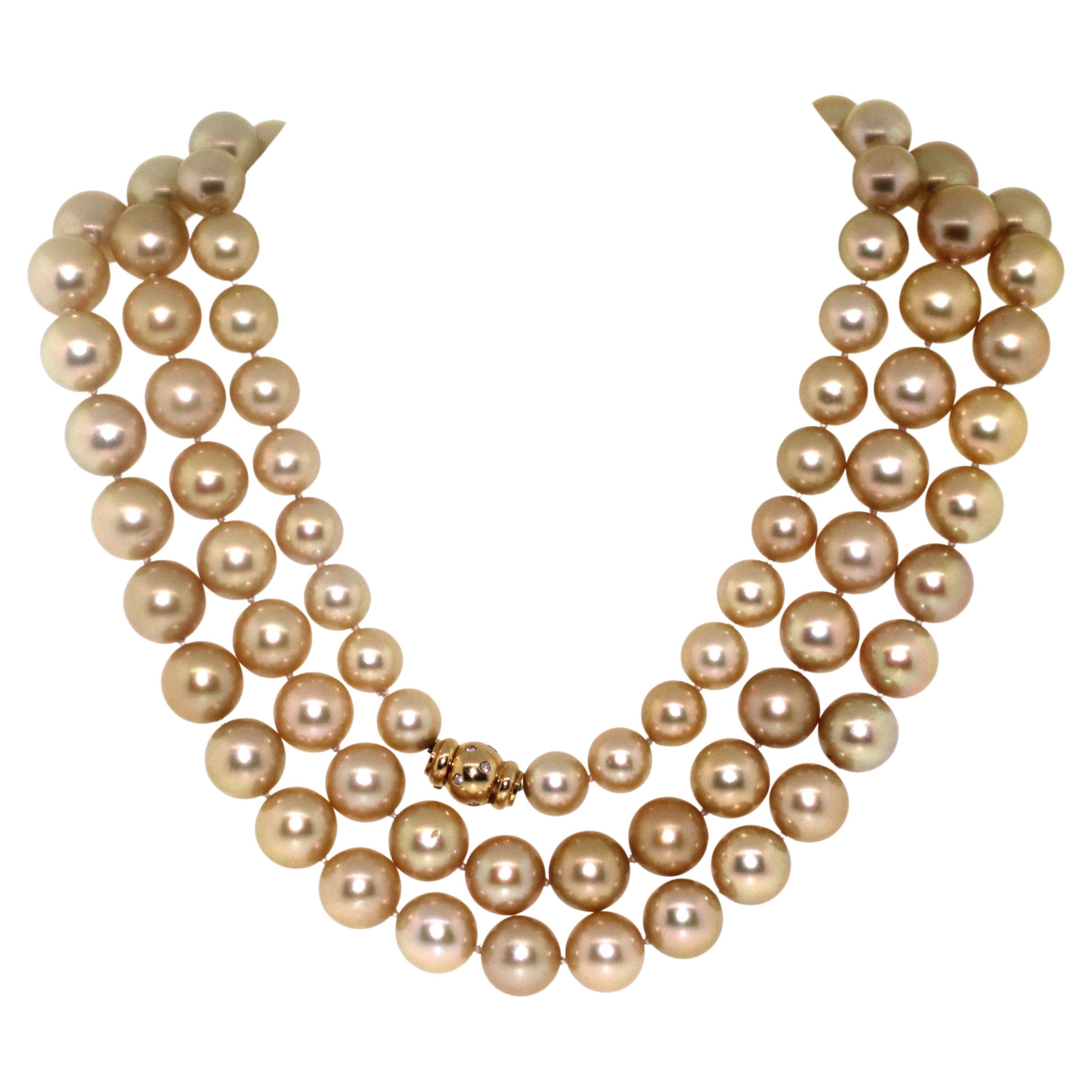 Hakimoto By Jewel Of Ocean
Suggested Redtail Price $100,000
99 Golden South Sea Pearl 10x14mm Rope Necklace 18K Diamonds Yellow Gold Clasp
50.5