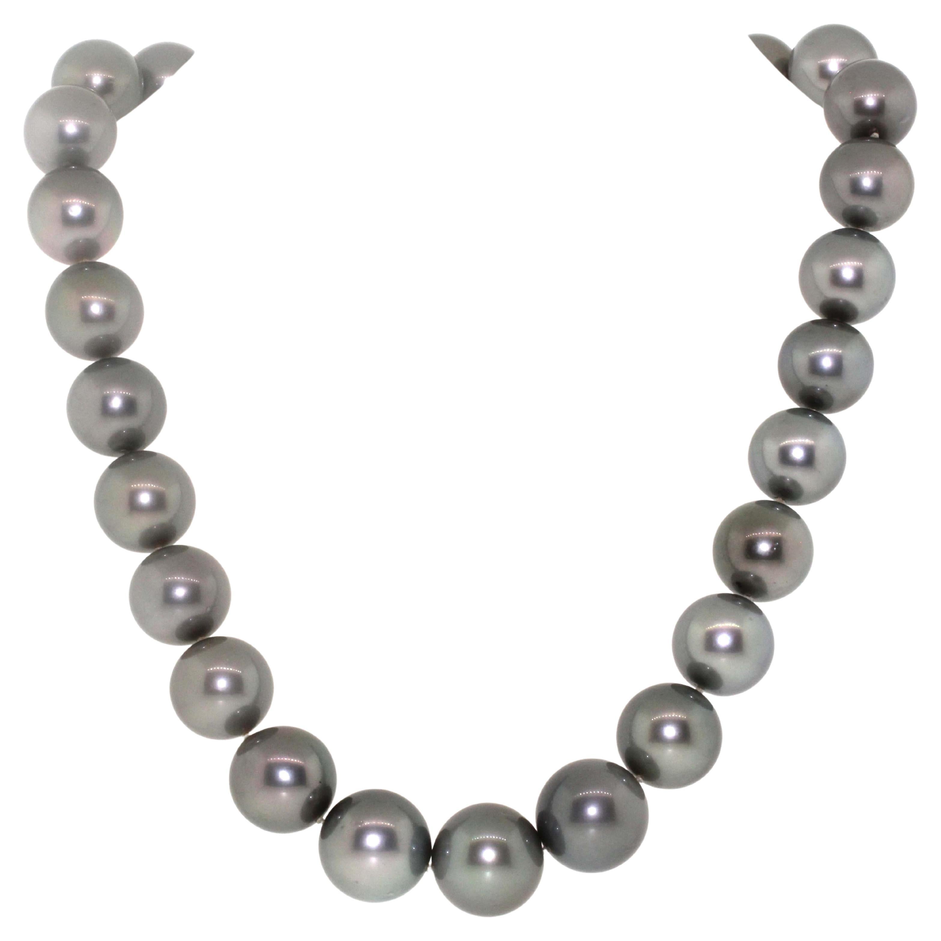 Hakimoto By Jewel Of Ocean 18K PEARL STRAND NECKLACE 
18K Yellow Gold  
Weight (g): 125
Cultured Tahitian South Sea Pearl 
Pearl Size: 16X14mm 
Pearl Shape: Round 
Body color: Silver Gray
Orient: Good
Luster: Good 
Surface: Clean
Nacre: