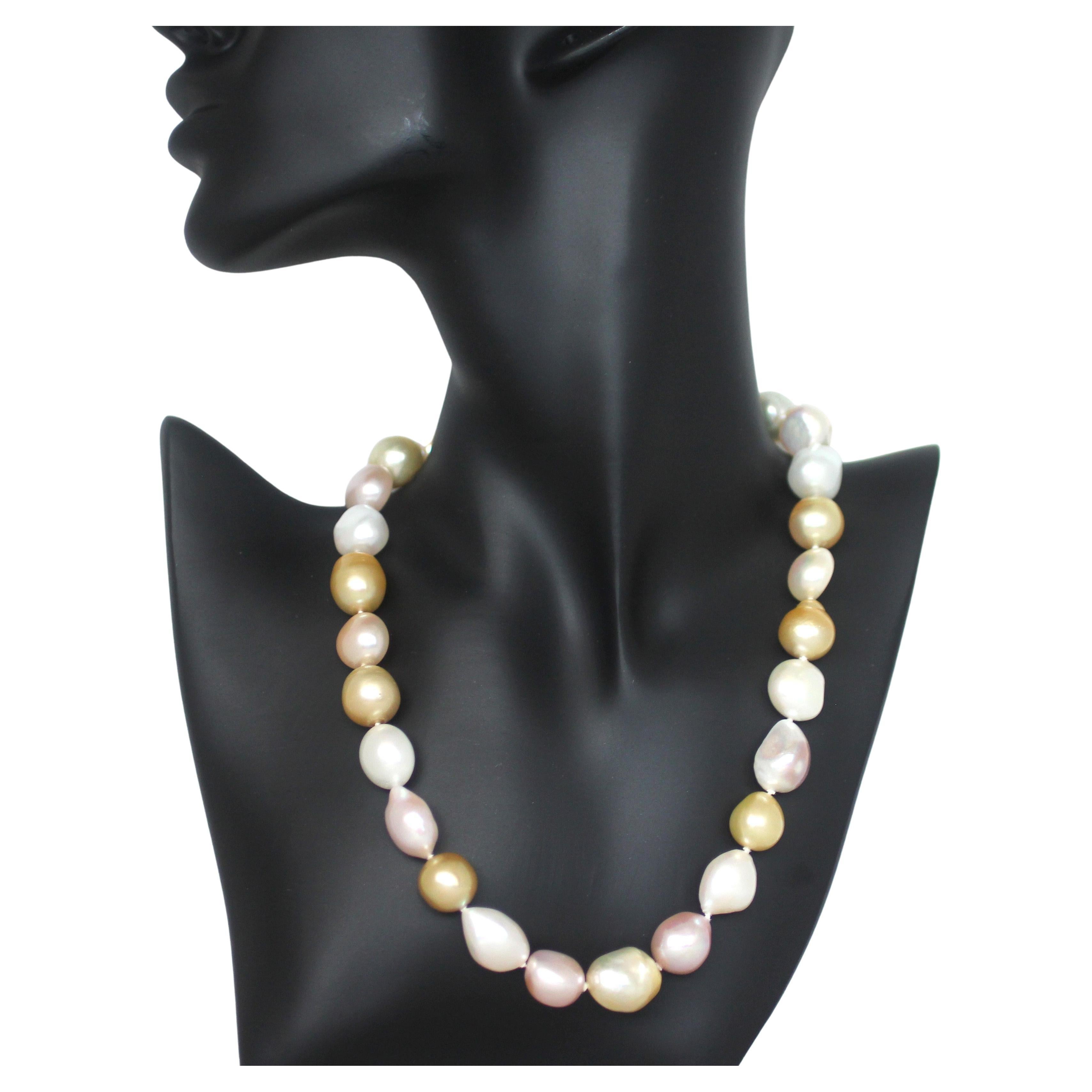 Hakimoto By Jewel Of Ocean 18K Strand Necklace
18K Yellow Gold  
Weight (g): 86.5
Cultured Golden South Sea and Fresh Water Baroque Pearl 
Pearl Size: 13X15mm 
Pearl Shape: Baroque
Body color: Natural Pastel Color
Orient: Very Good
Luster: Very Good