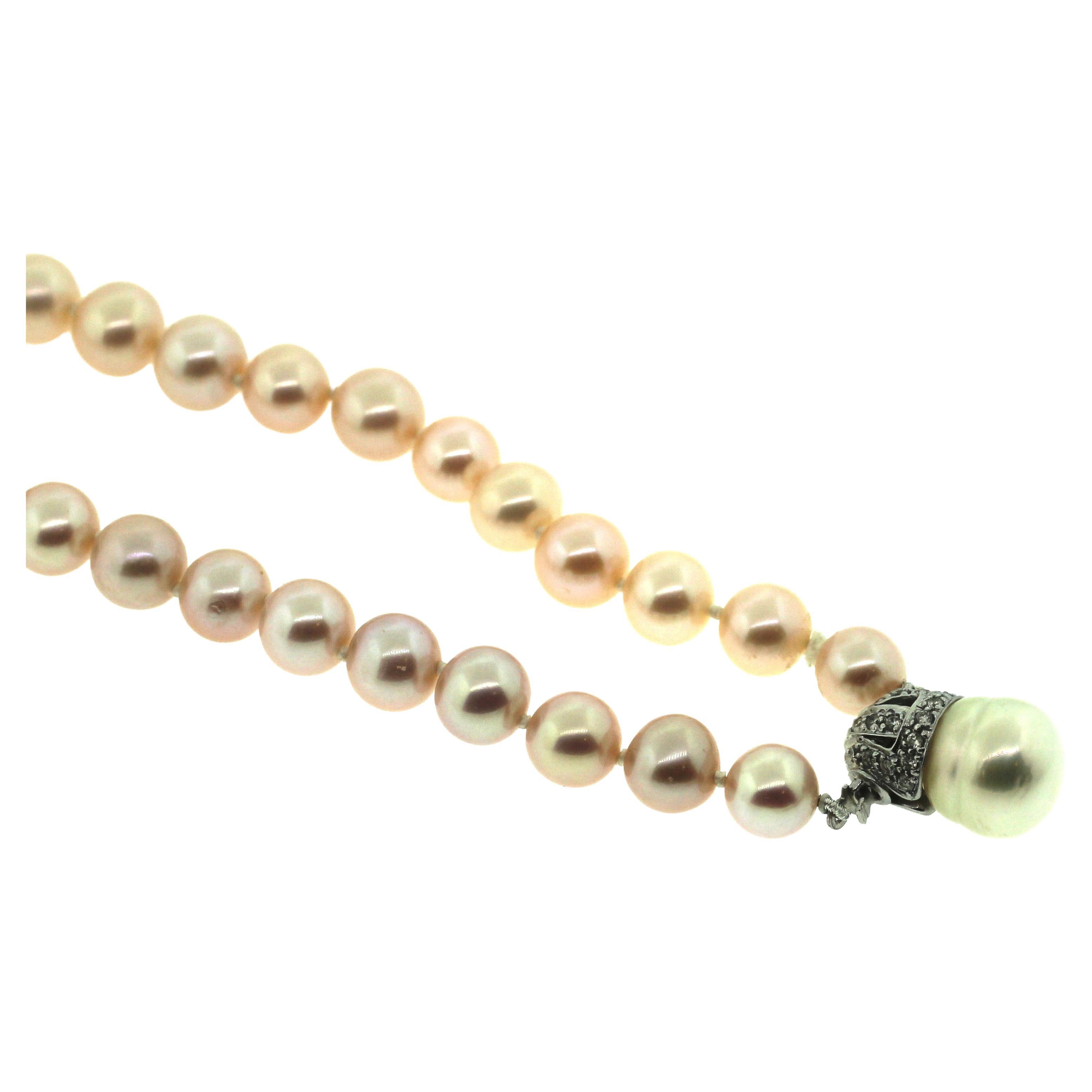 Hakimoto Pink Cultured Pearl Necklace
18K Diamonds Clacp
16.5 inches
8-7mm