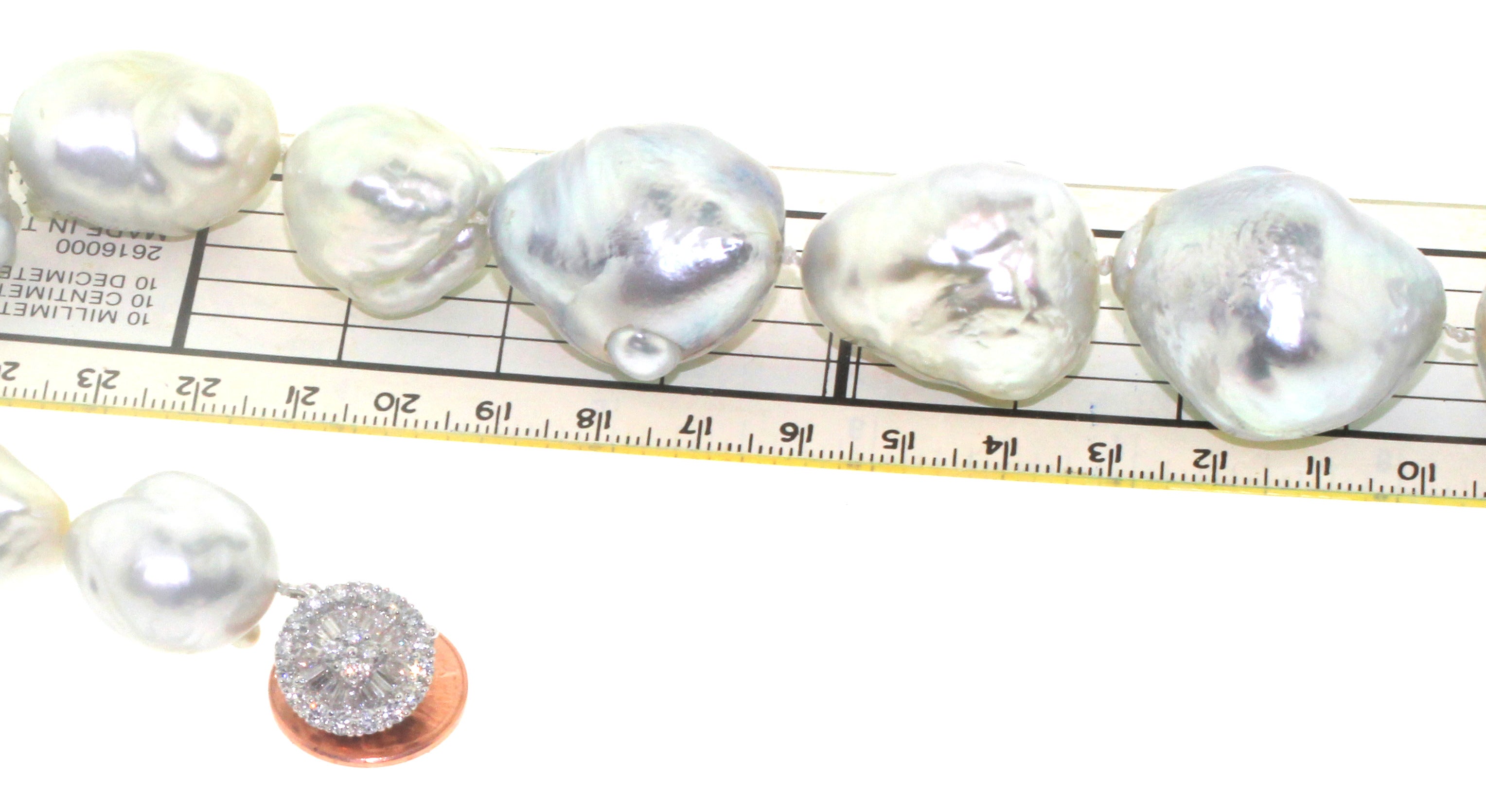 Hakimoto Rare perle baroque des mers du Sud 32x20 mm 19,5