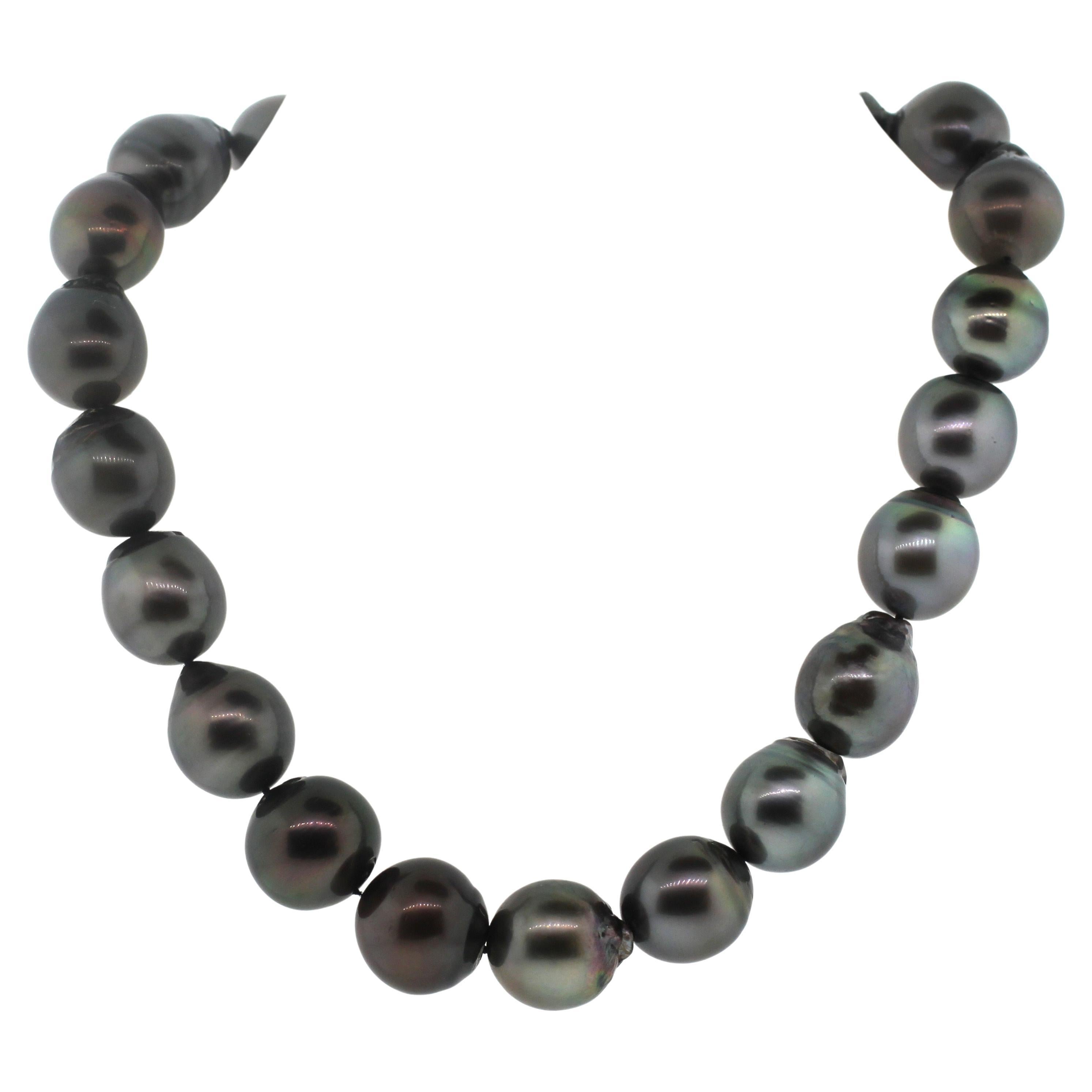 Hakimoto By Jewel Of Ocean 18K Tahitian South Sea Strand Necklace
18K White Gold With Diamonds 
Weight (g): 132.7
Cultured Tahitian South Sea Baroque Pearl 
Pearl Size: 17X15mm 
Pearl Shape: Baroque
Body color: Gray
Orient: Very Good
Luster: Very