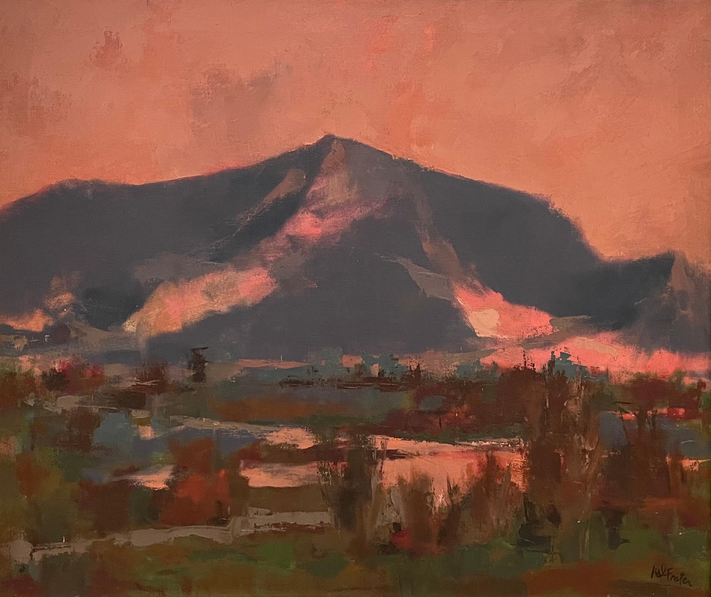 Hal Frater's "Pink Sky" is a moody landscape that masterfully captures the play of light at dusk. Dominated by a majestic mountain under a vast, dusky sky, the painting is steeped in warm shades of pink and red that wash across the canvas, lending a