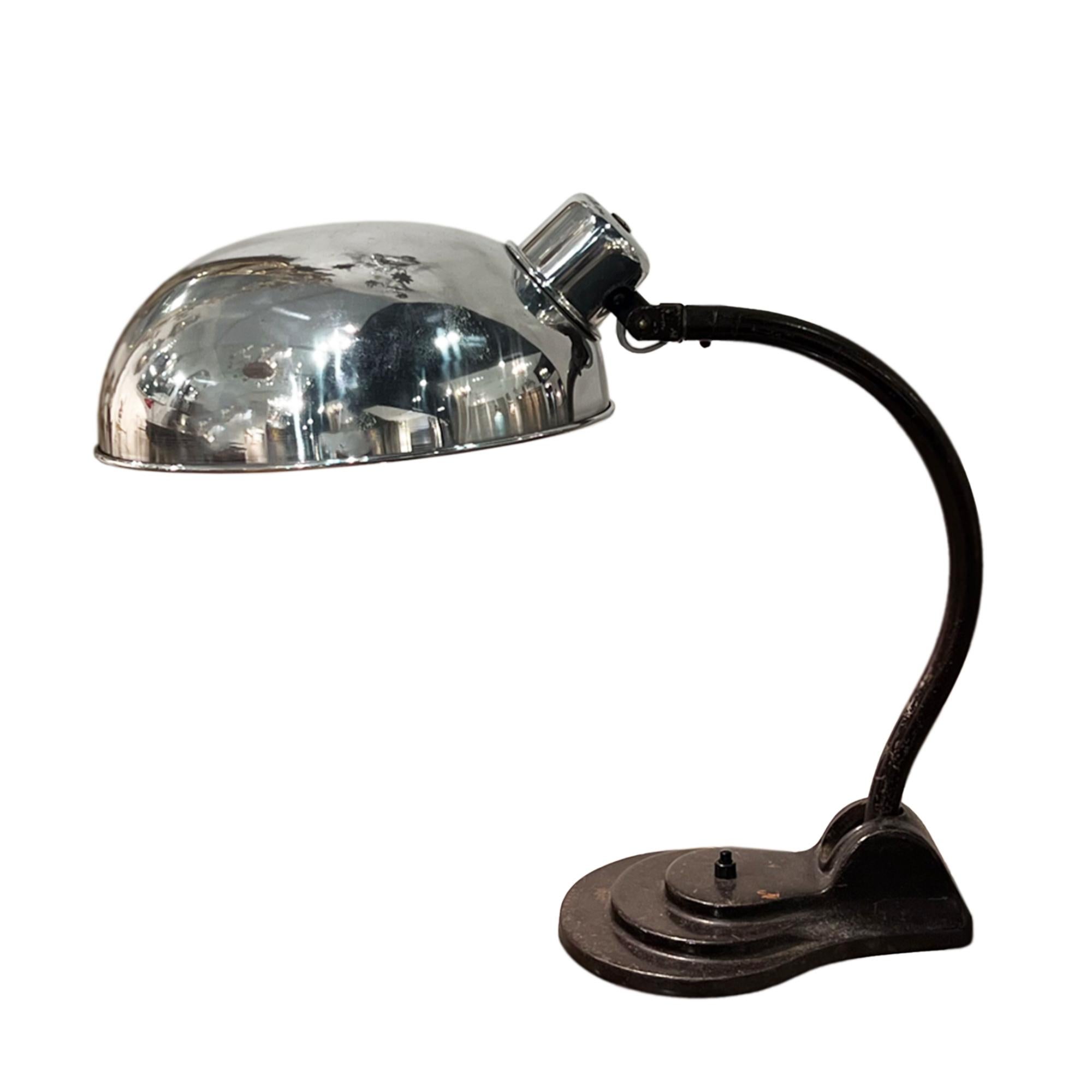 This is a fantastic desk lamp made by Hala in the Netherlands in the 1950s. 

A lovely staggered solid metal base with the original button on/off switch and domed, polished shade. 

We've wired this light for the UK, but we can adapt this for any