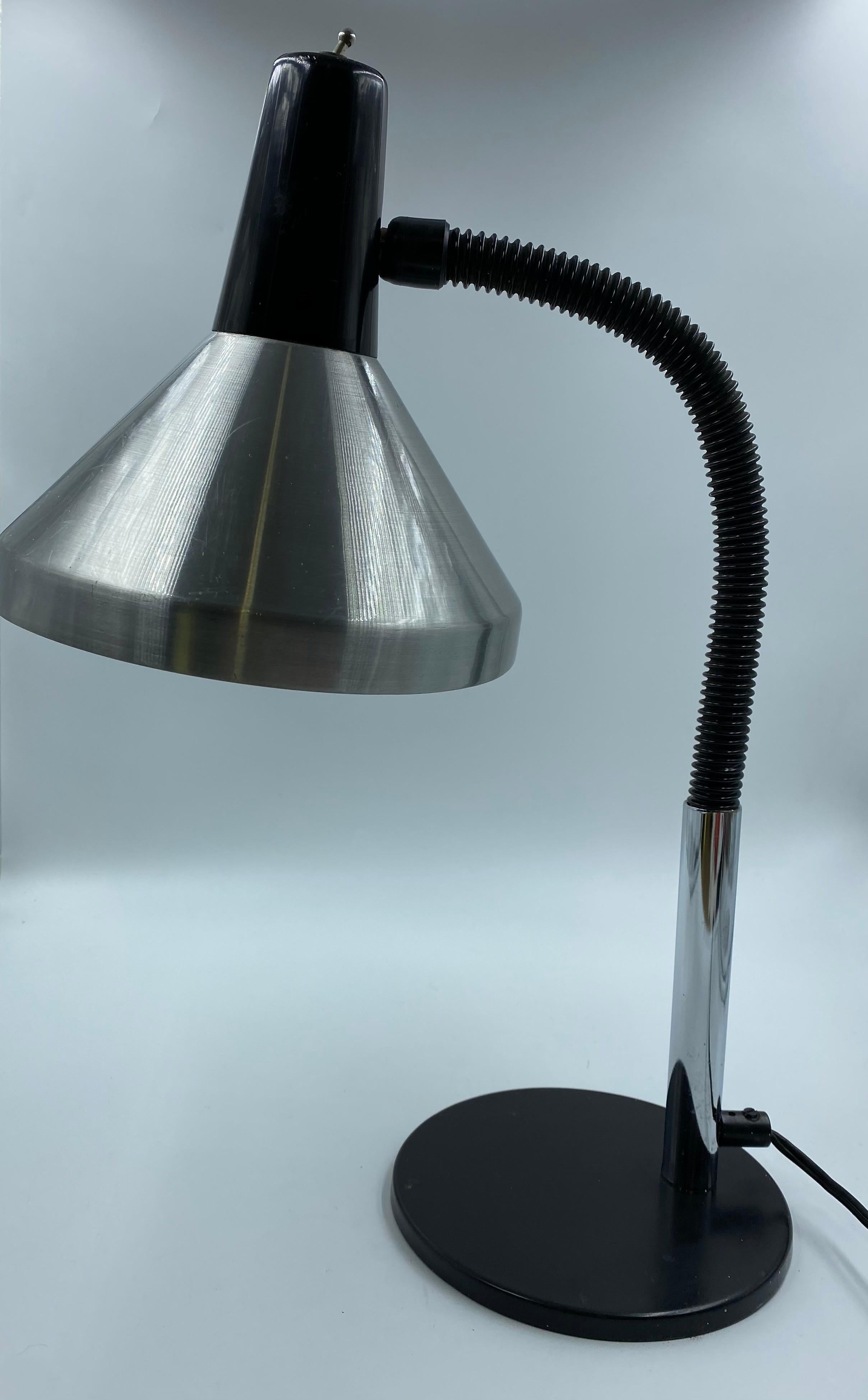 Hala Zeist 751 desk lamp by Herman Busquet, 1967. 
Black base, chrome parts, black gooseneck arm and an aluminium hood. 
TH 57 cm x ø hood 20,5x cm ø base 16 cm.